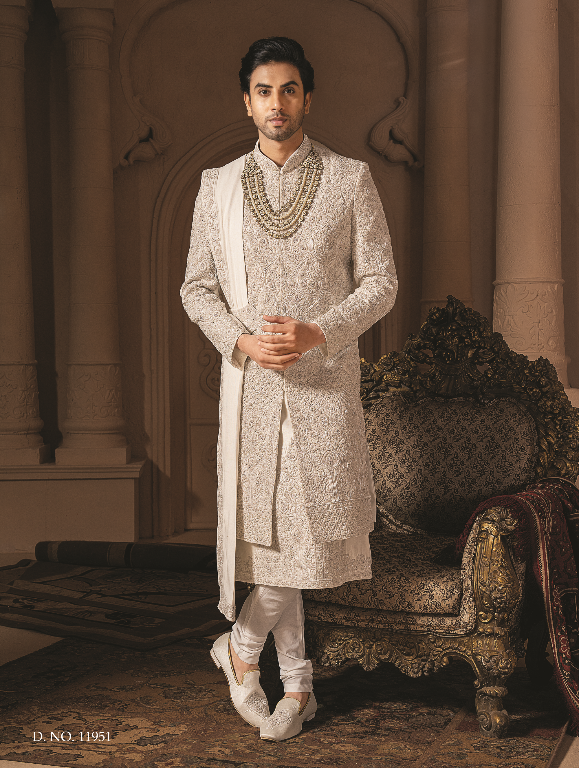 Ivory silk sherwani with golden embroidery
