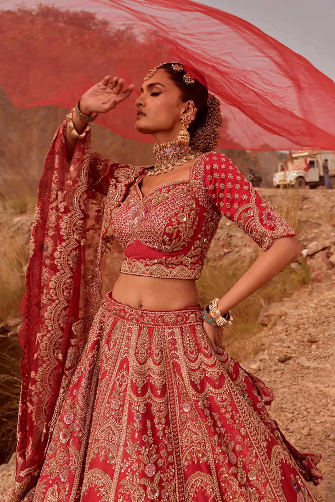 Red silk lehenga with zardozi work