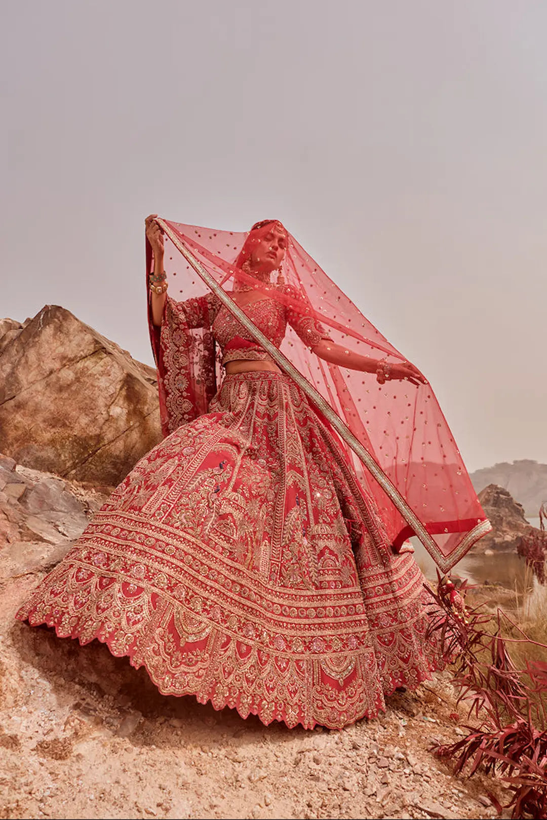 Red silk lehenga with zardozi work