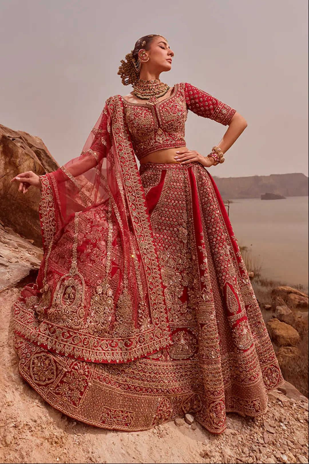 Classic red bridal lehenga with all over zari and thread work