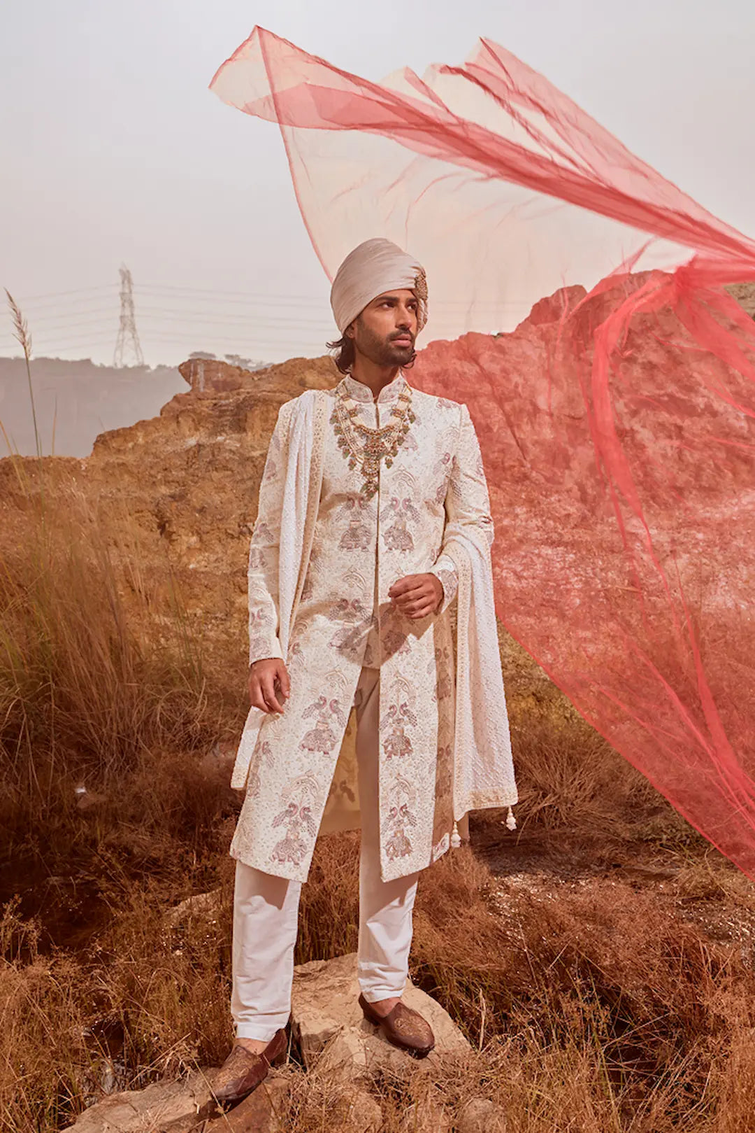 Off white Sherwani with elephant embroidery