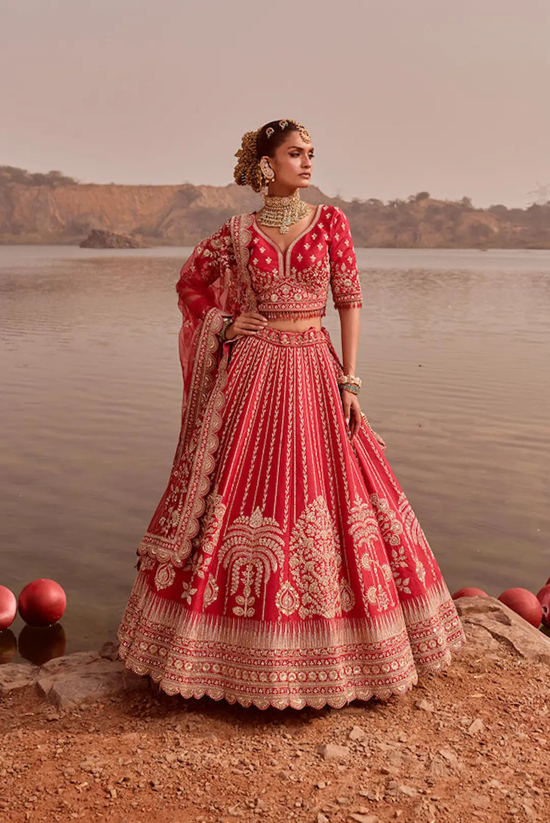 Red bridal lehenga with heavy zari and cutdana embroidery and dual dupatta