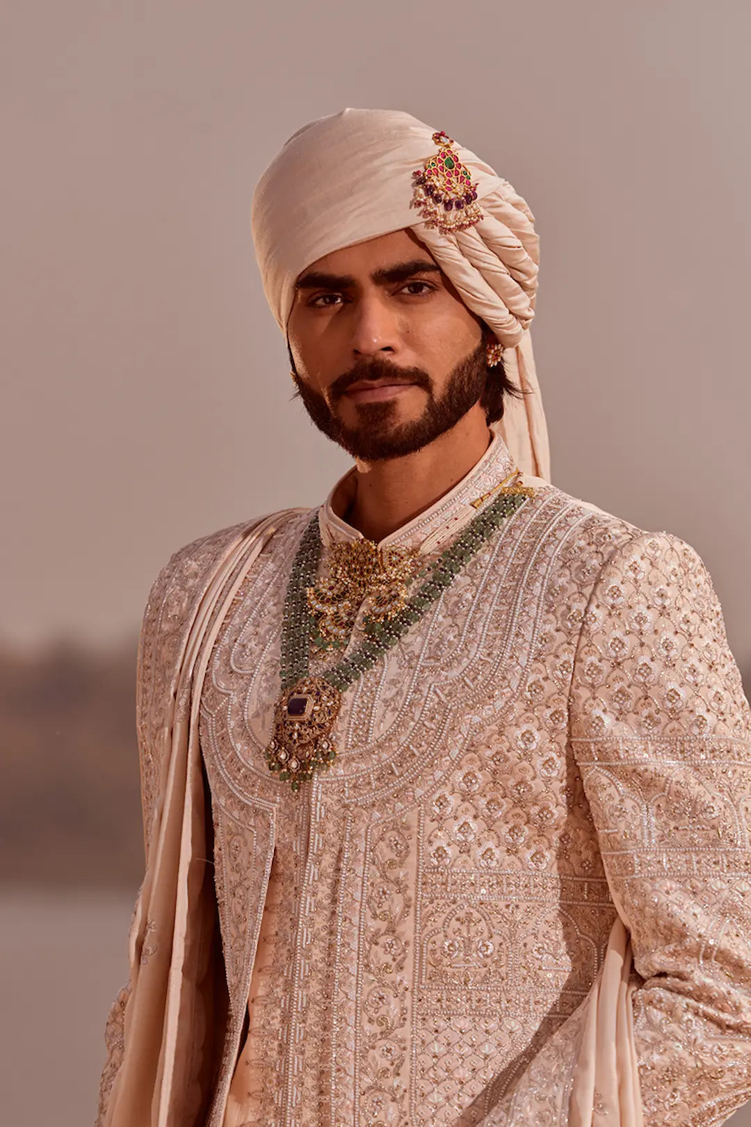 Rose gold silk Sherwani set in thread work embroidery