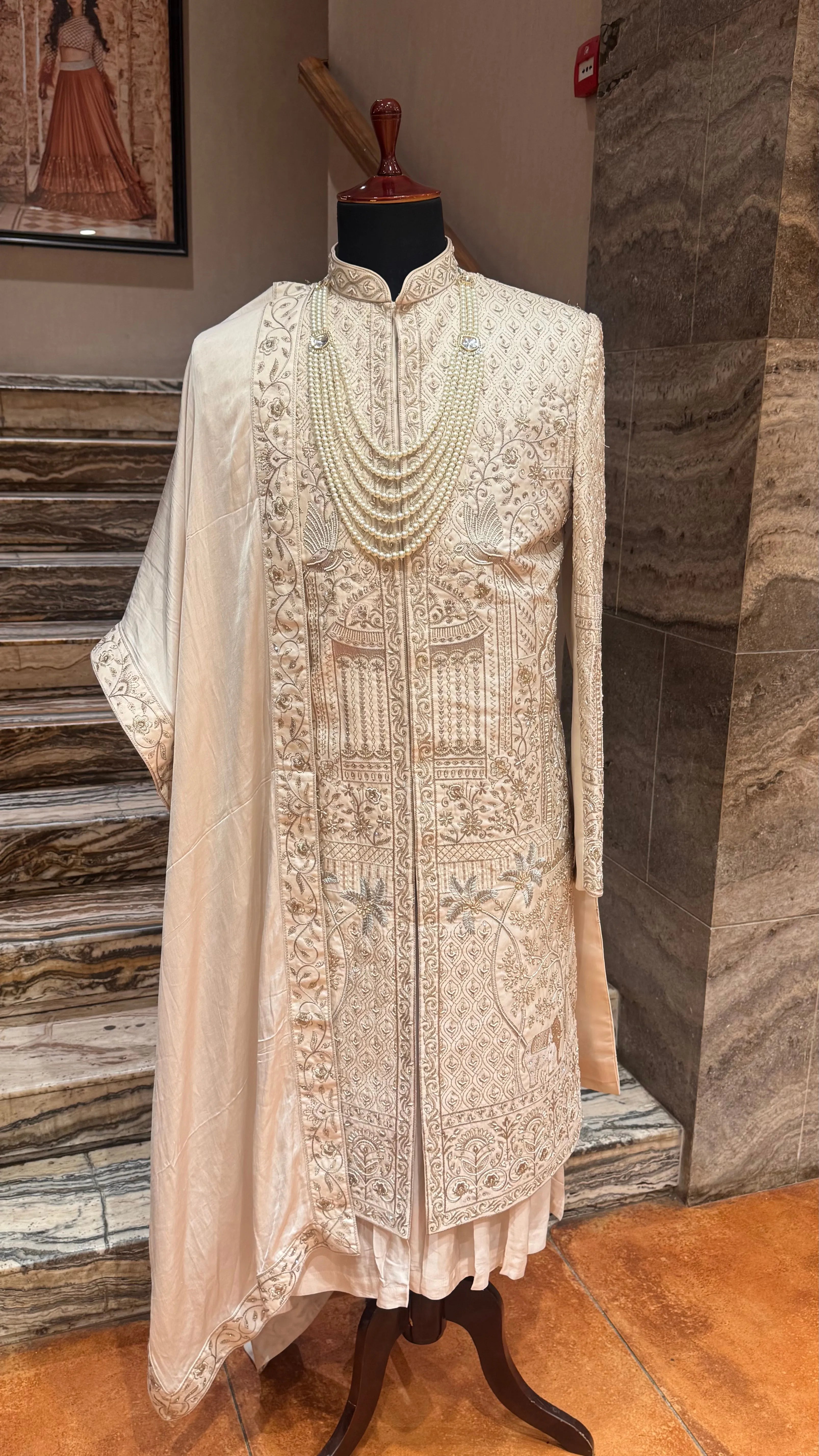 Off white silk Sherwani with intricate embroidery