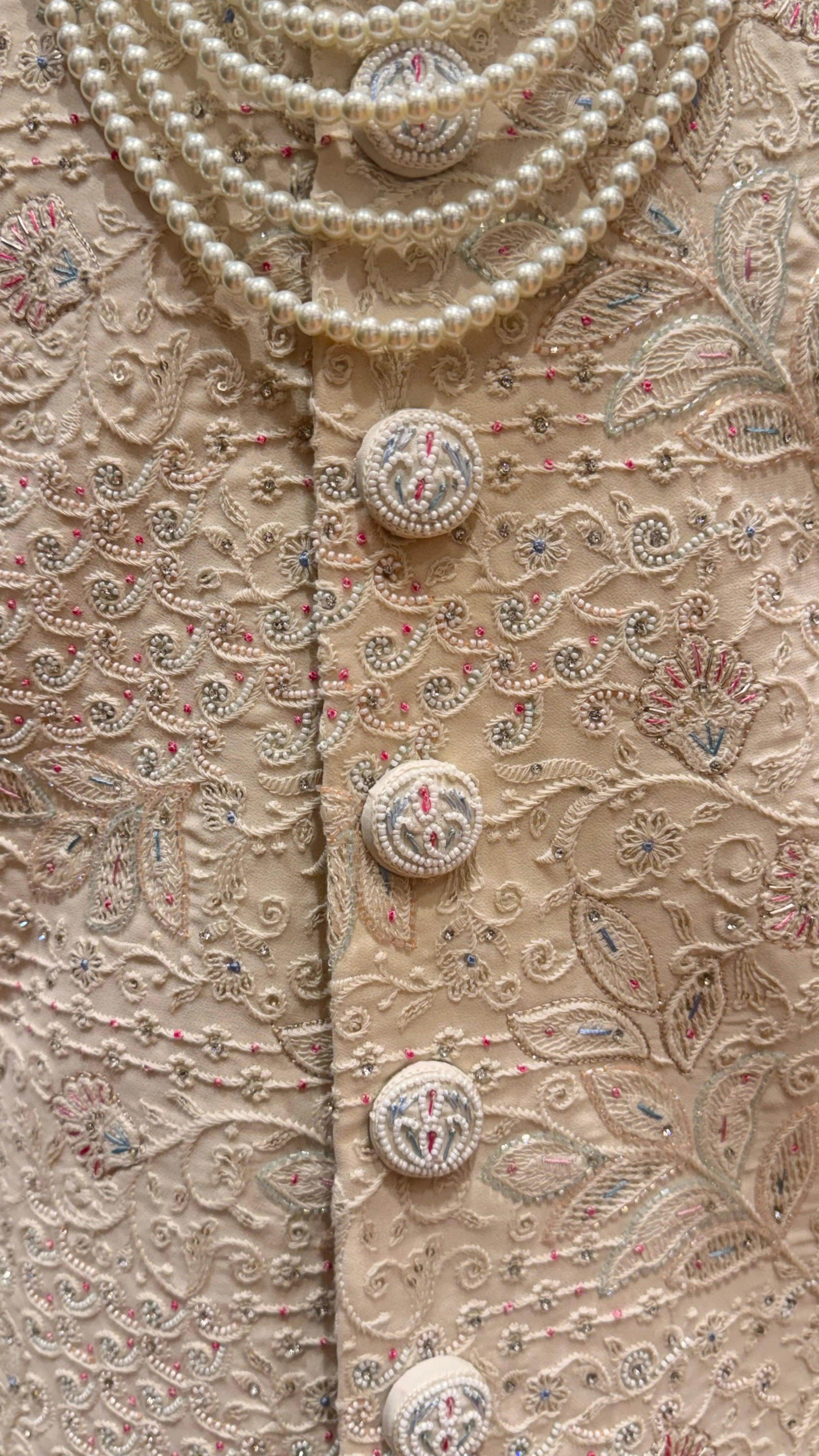 Cream silk Sherwani with pearl embroidery