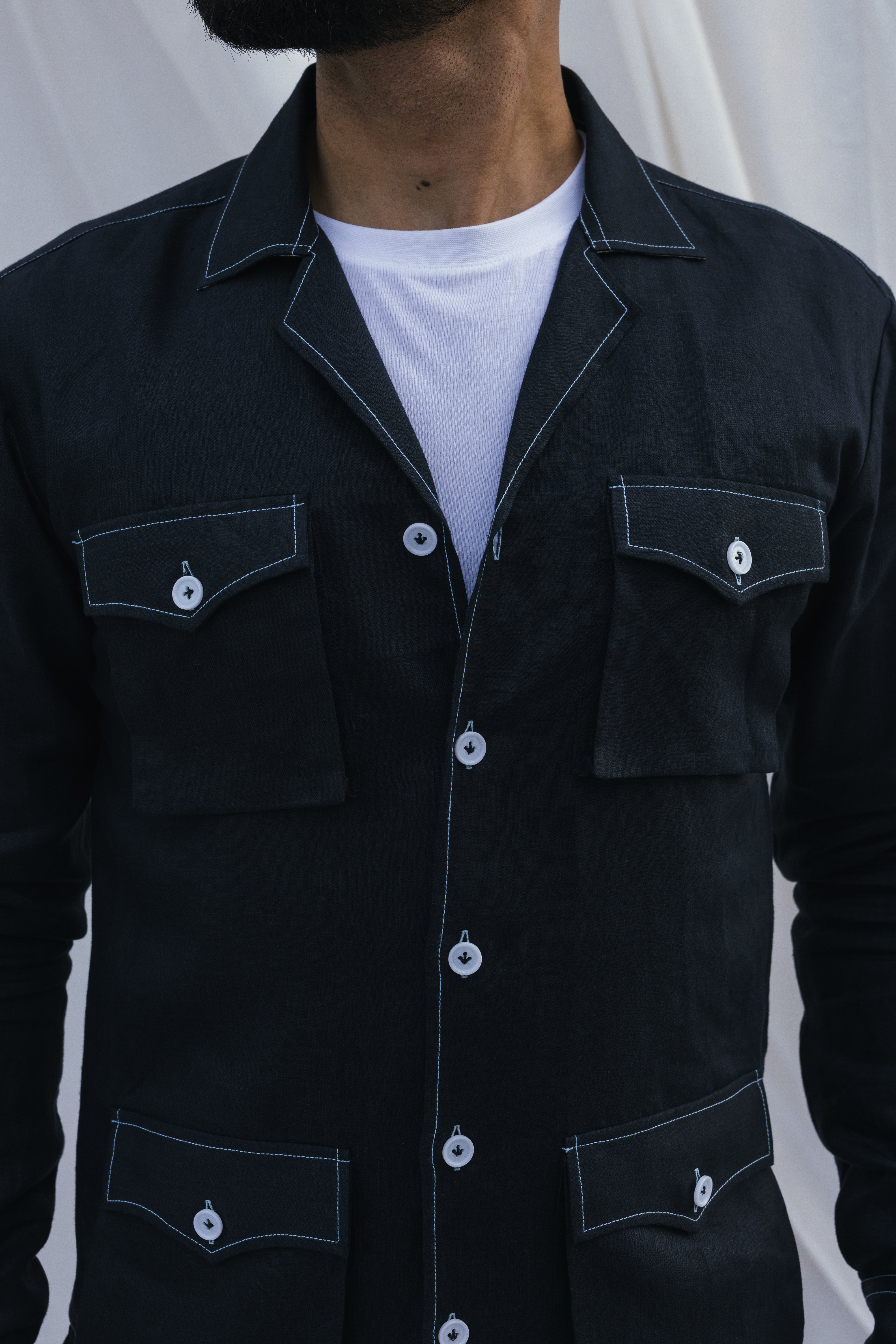 Black safari shirt with white contrast stitch and floral detail