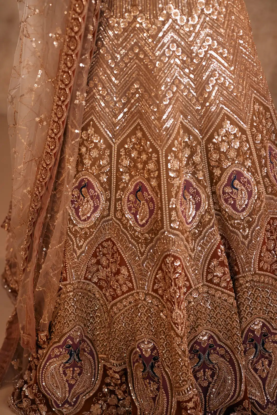 Gold embroidered lehenga with peacock motifs