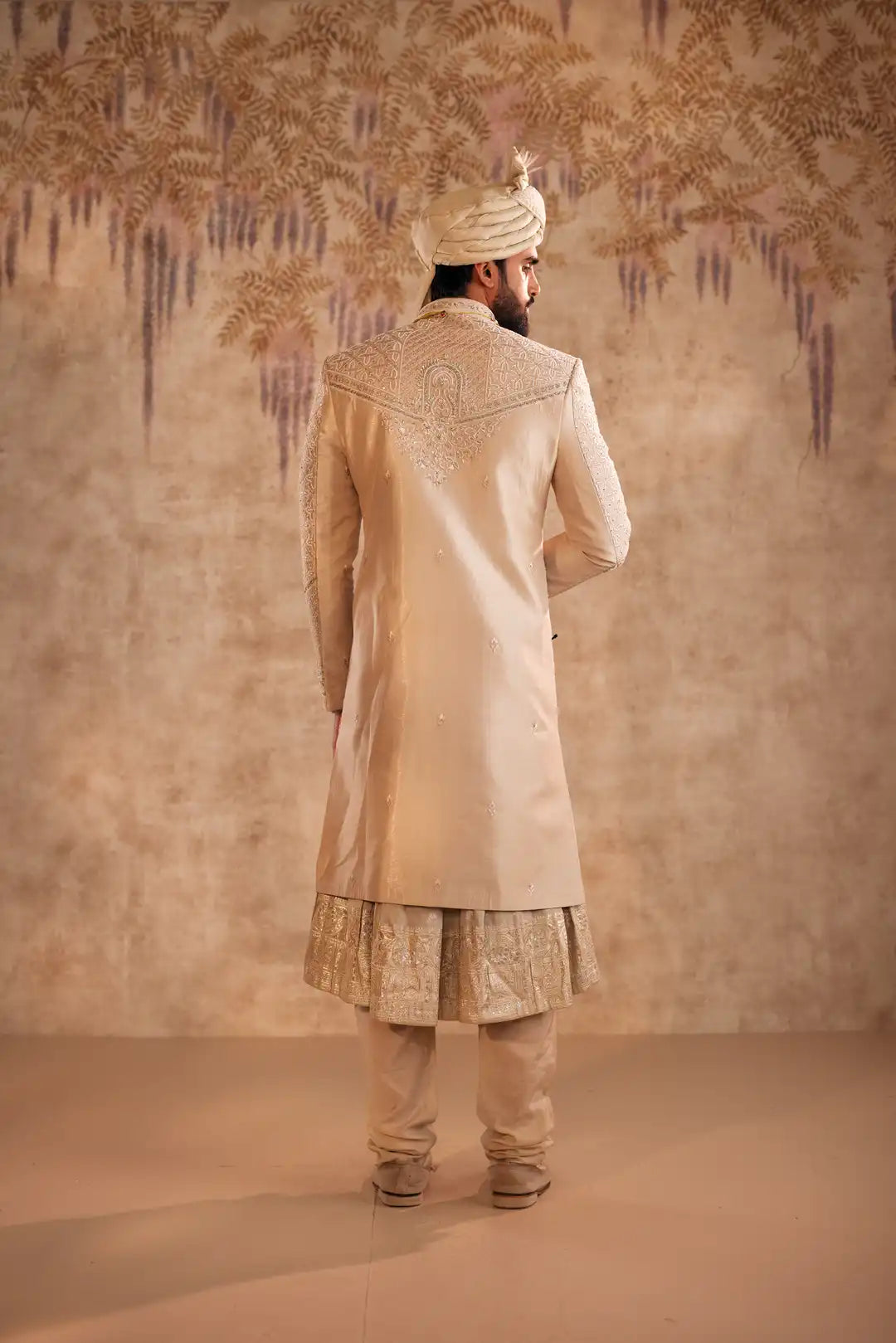 Gold Sherwani set with zardozi and Butti work