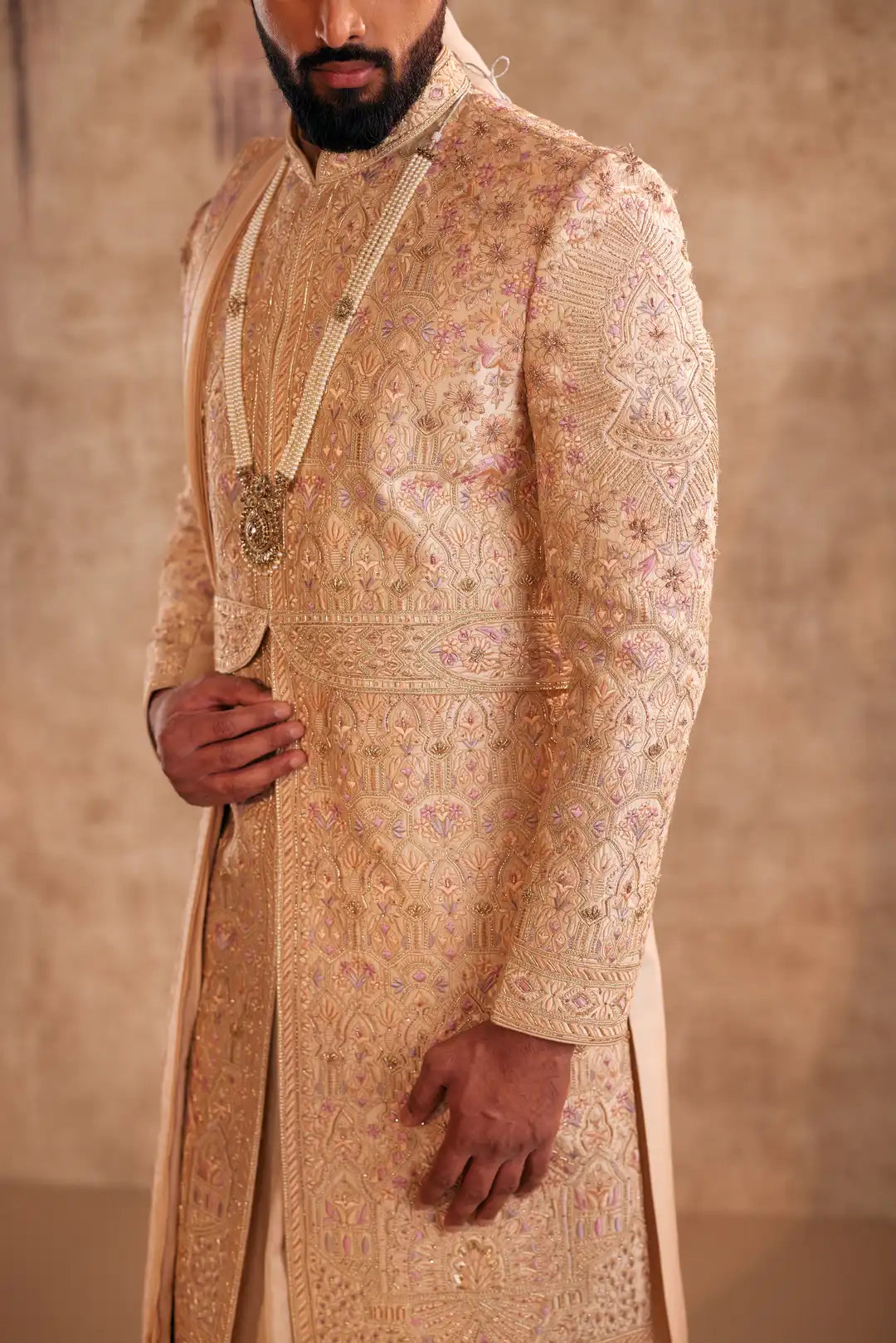 Gold Sherwani with multicolor thread work