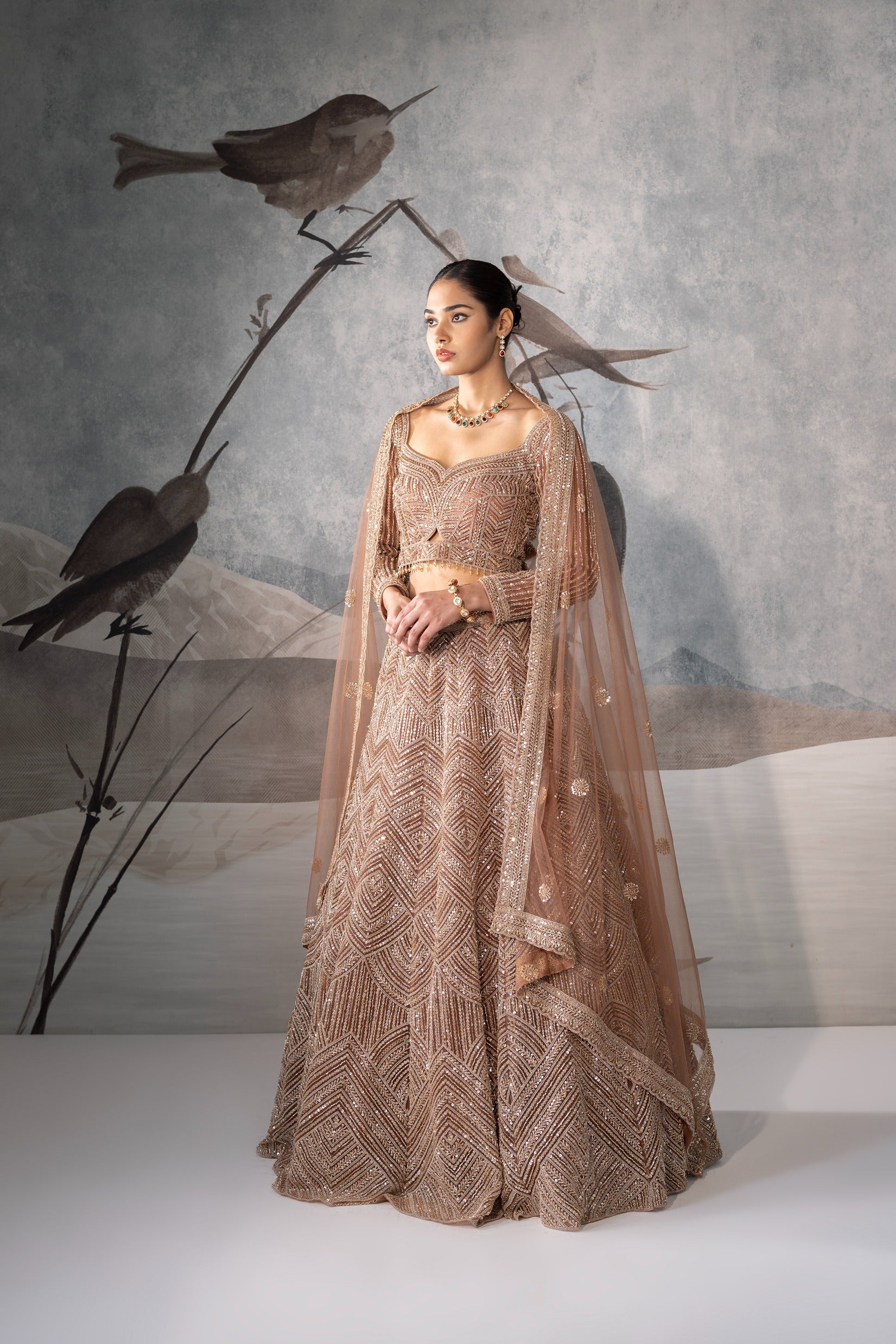 BROWN SEQUENCE EMBELLISHED LEHENGA