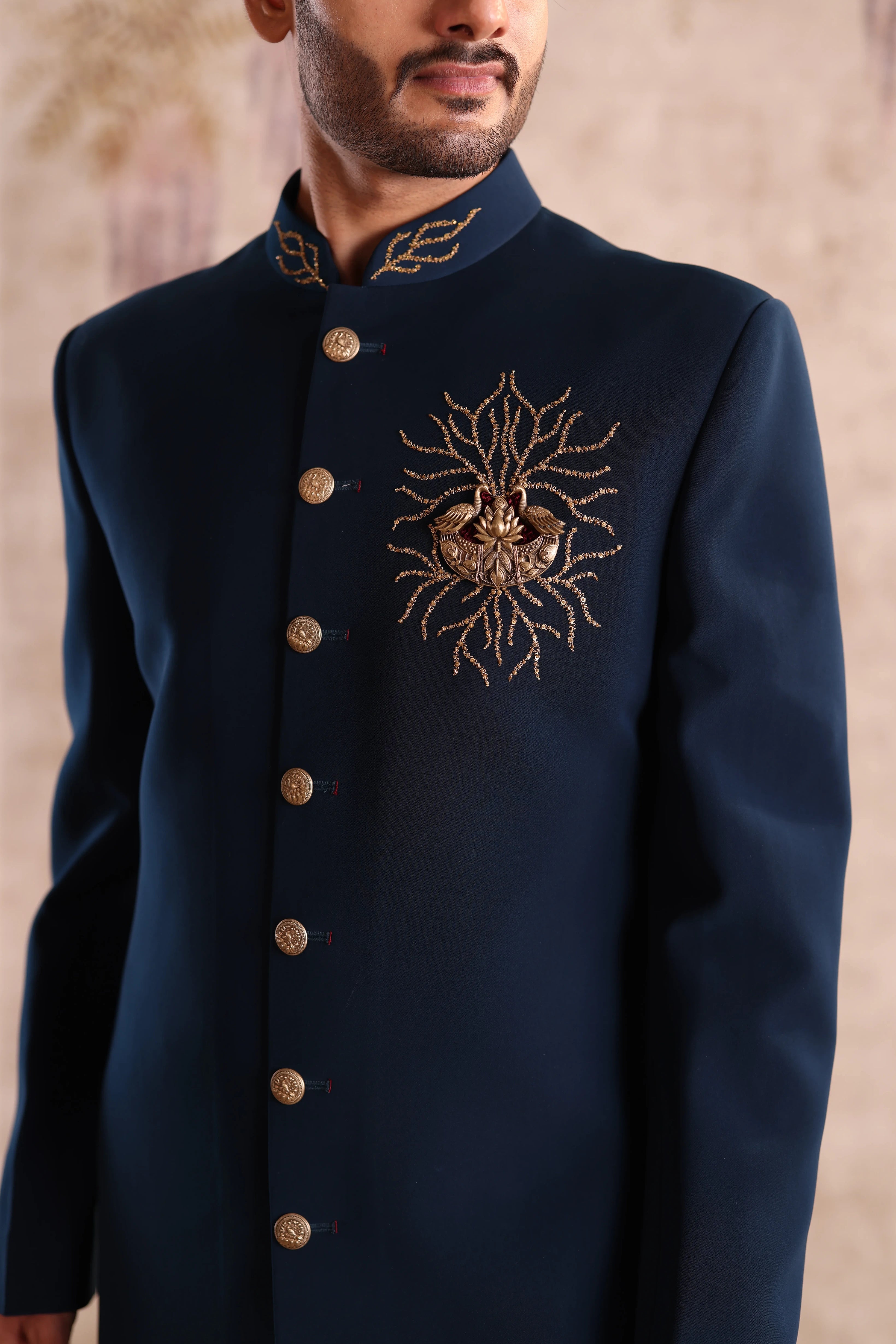 Teal indo western with collar embroidery and chest brooch highlight with embroider