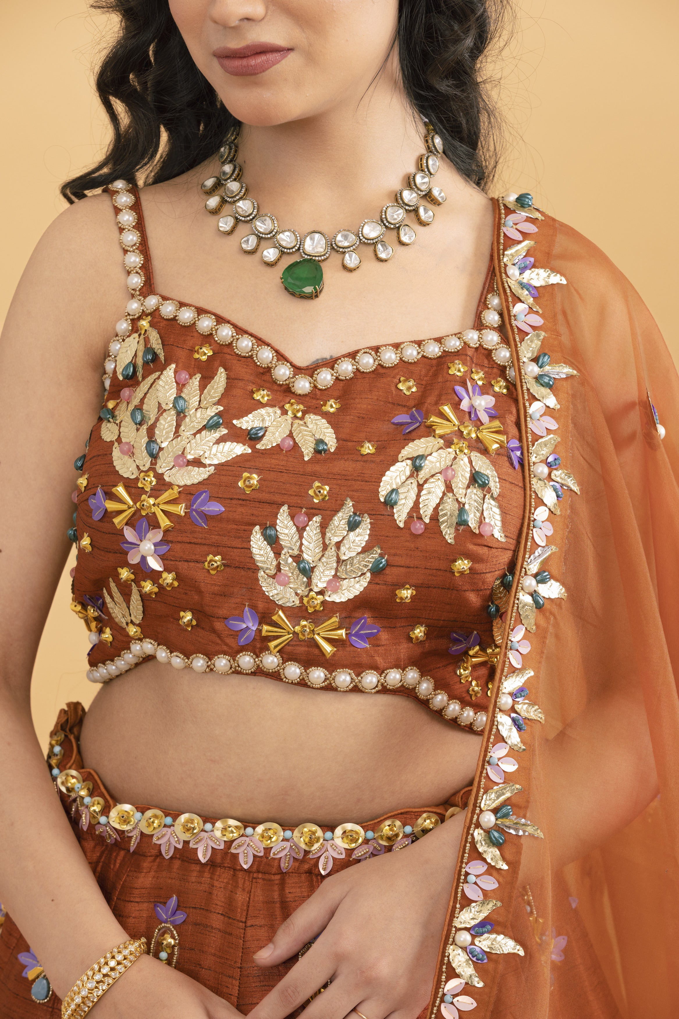 Rust Silk lehenga with multicolour sequins