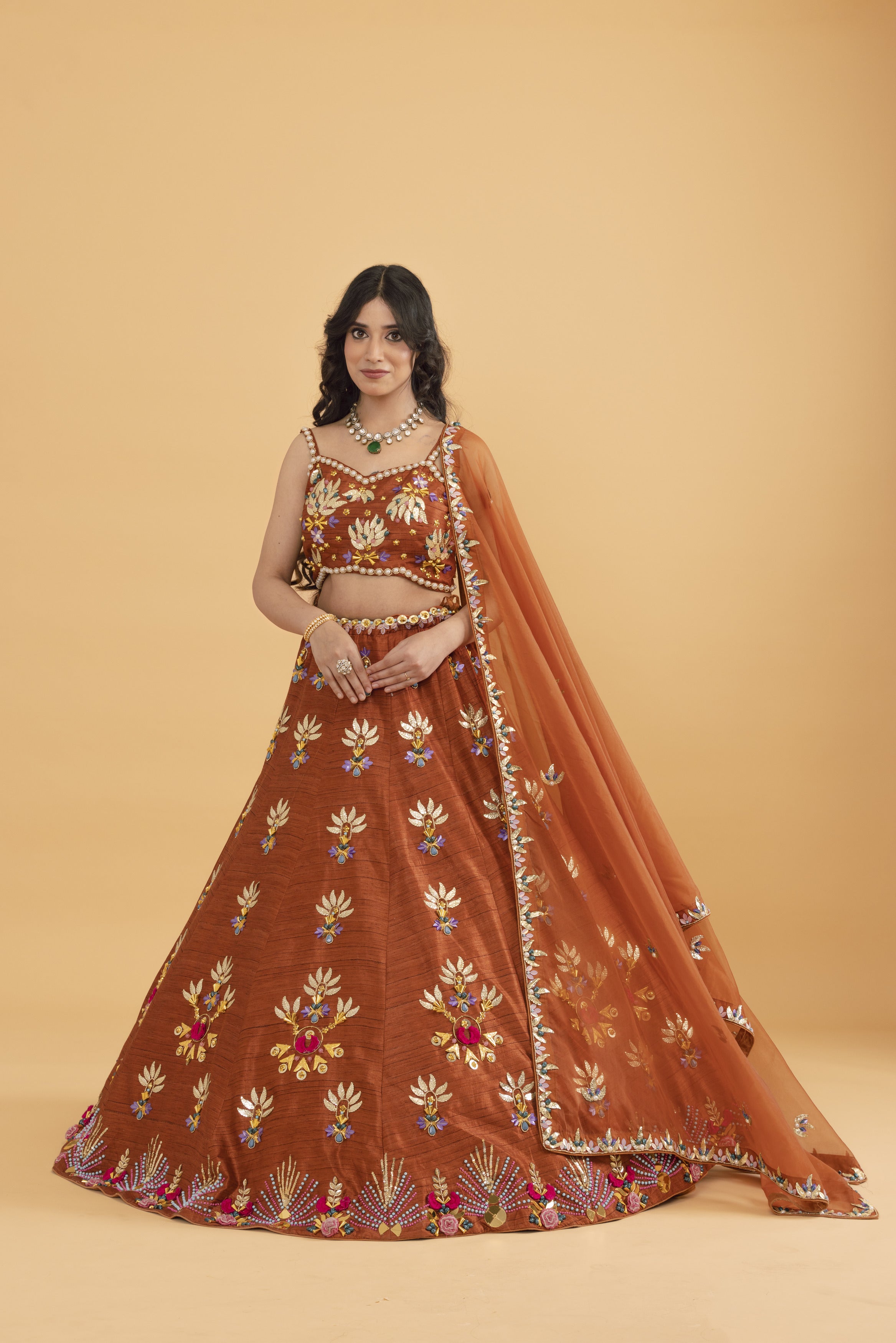 Rust Silk lehenga with multicolour sequins
