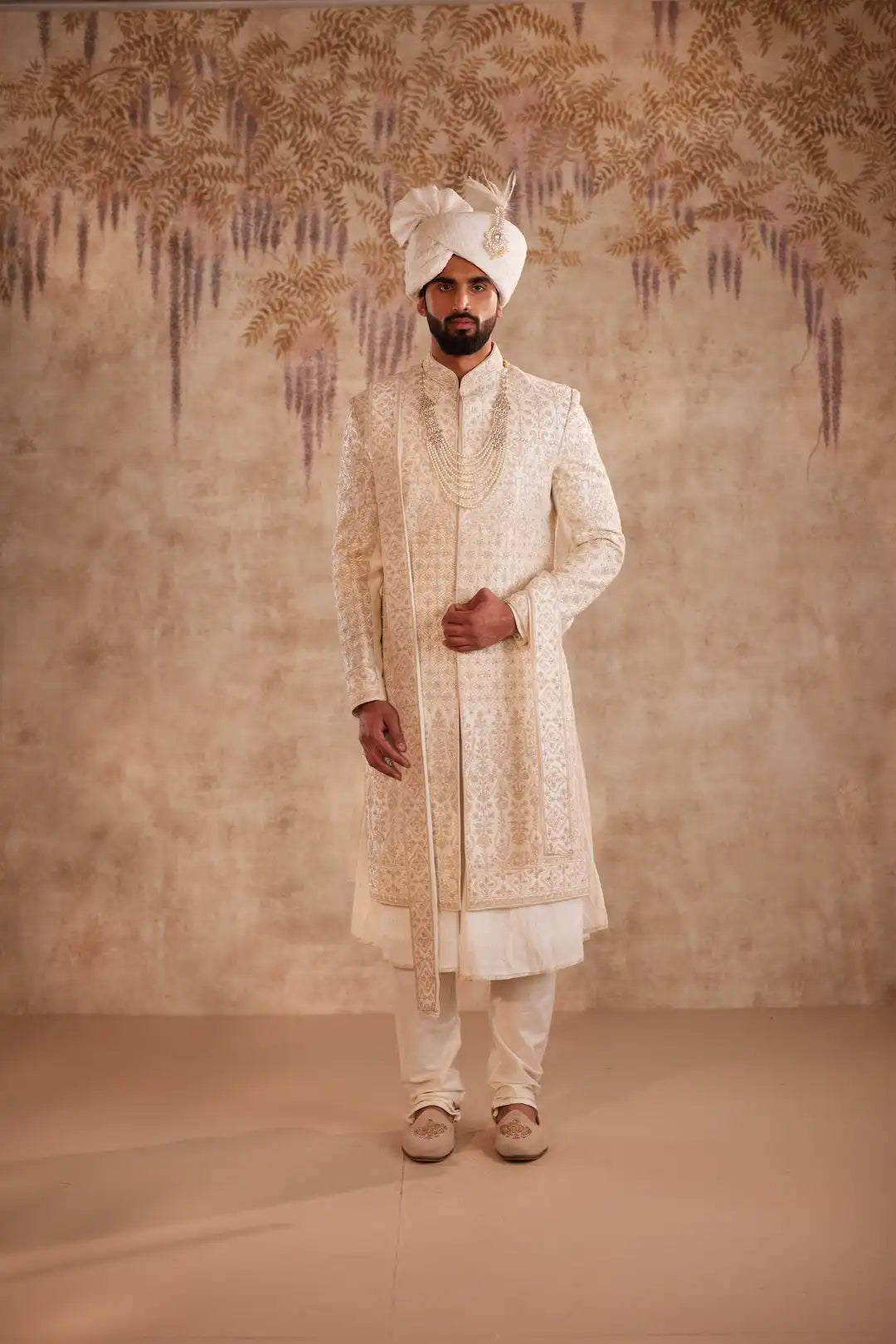 Ivory Sherwani suit with beads and zari work