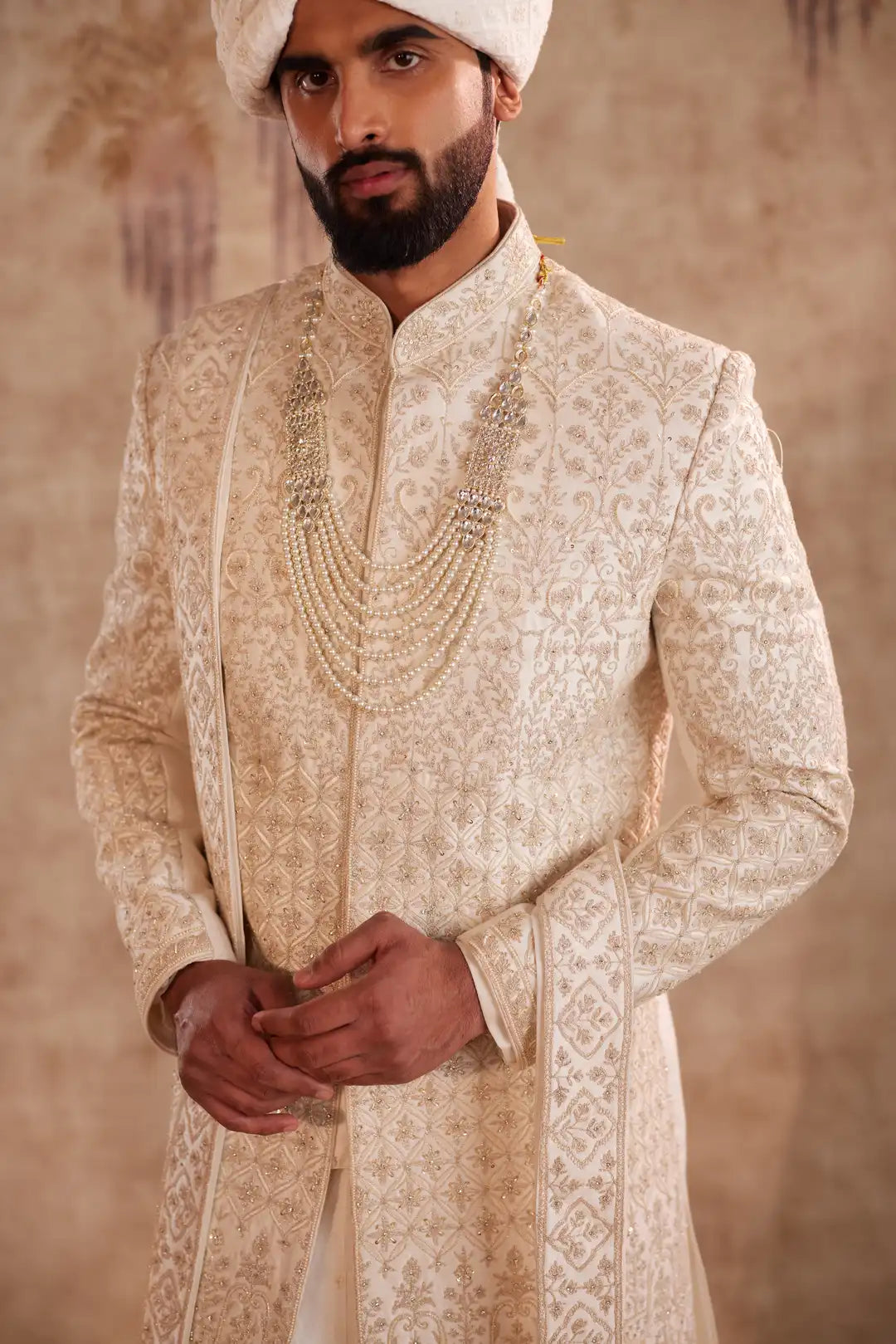 Ivory Sherwani suit with beads and zari work