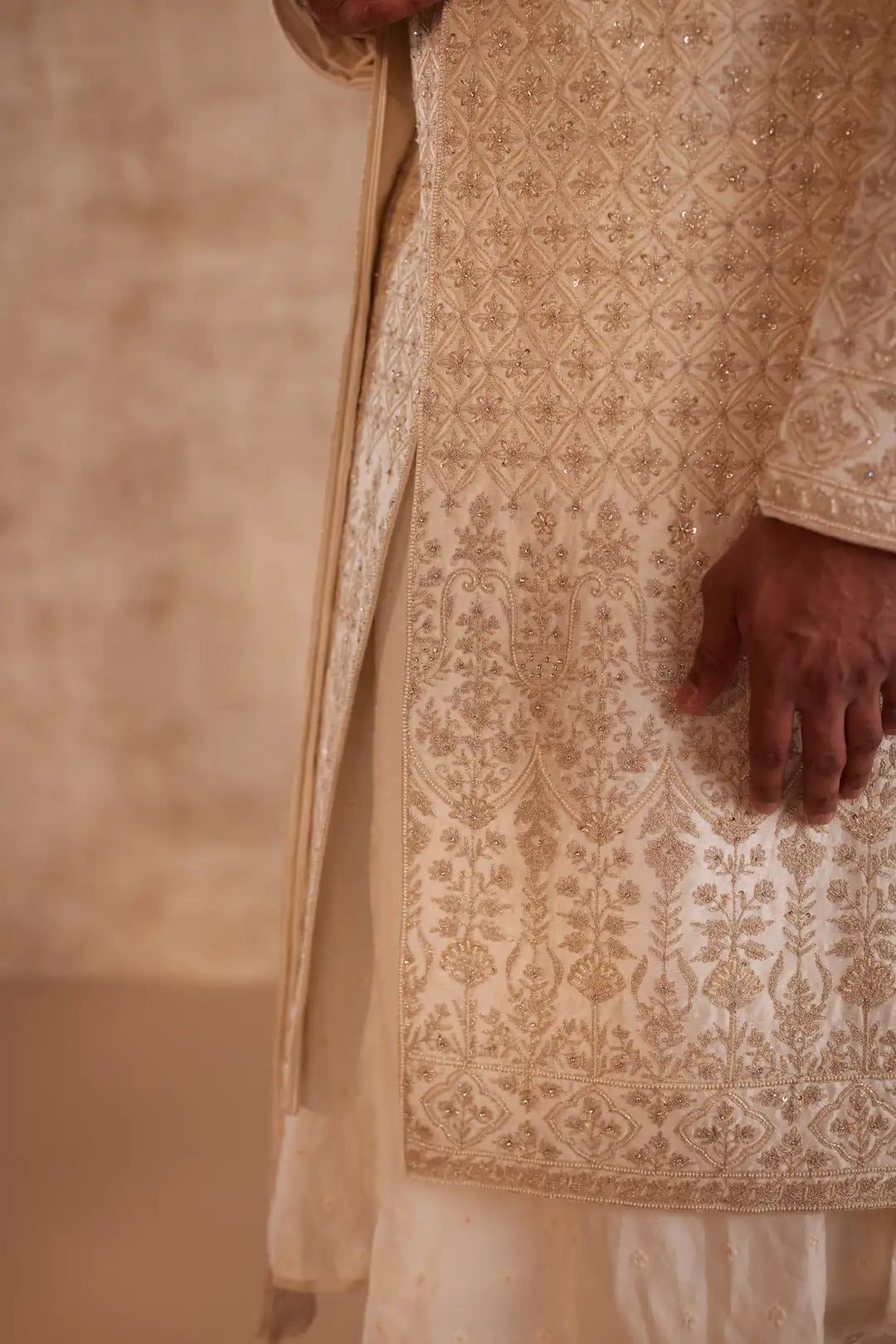 Ivory Sherwani suit with beads and zari work