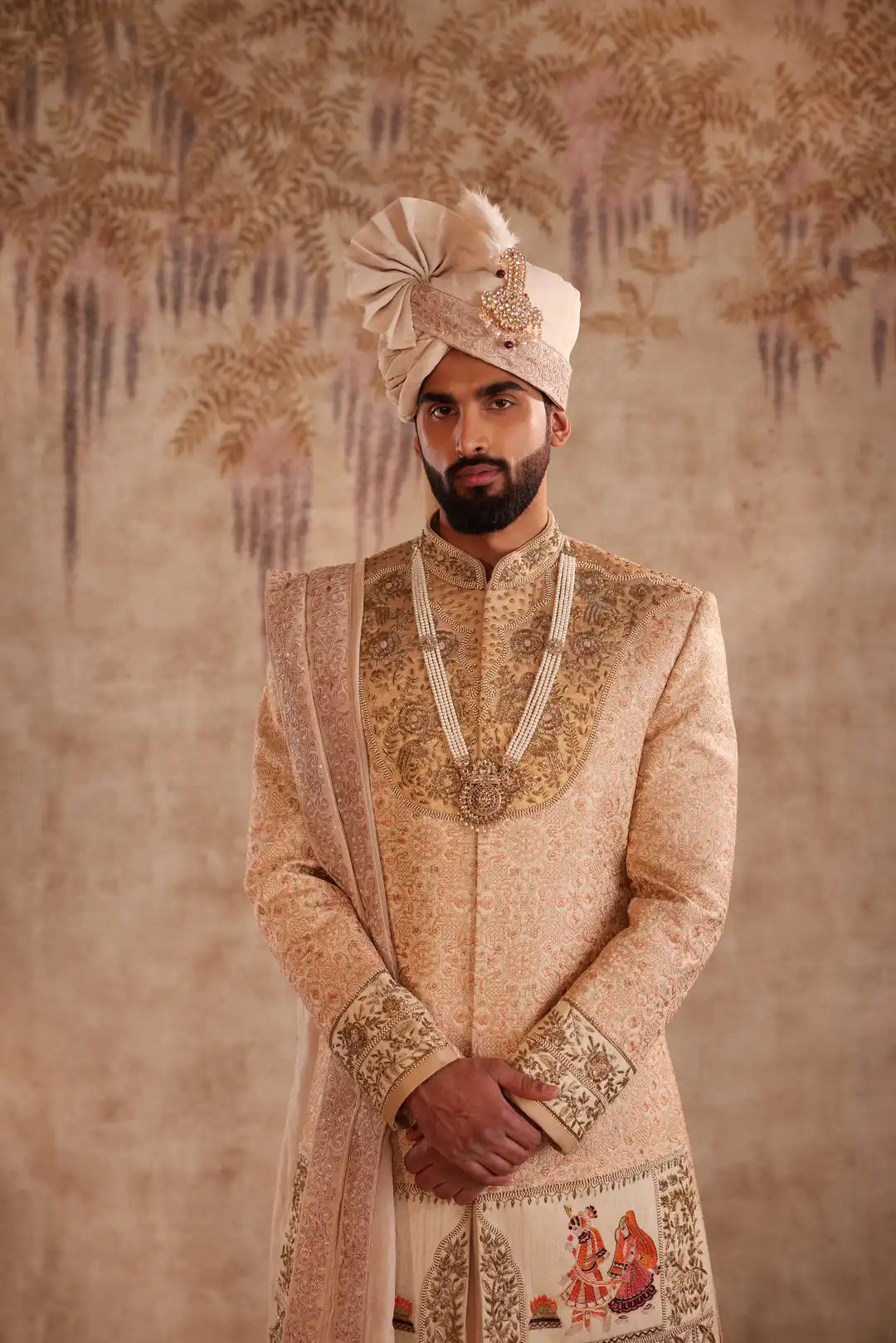 Gold silk Sherwani for groom with intricate hand embroidery
