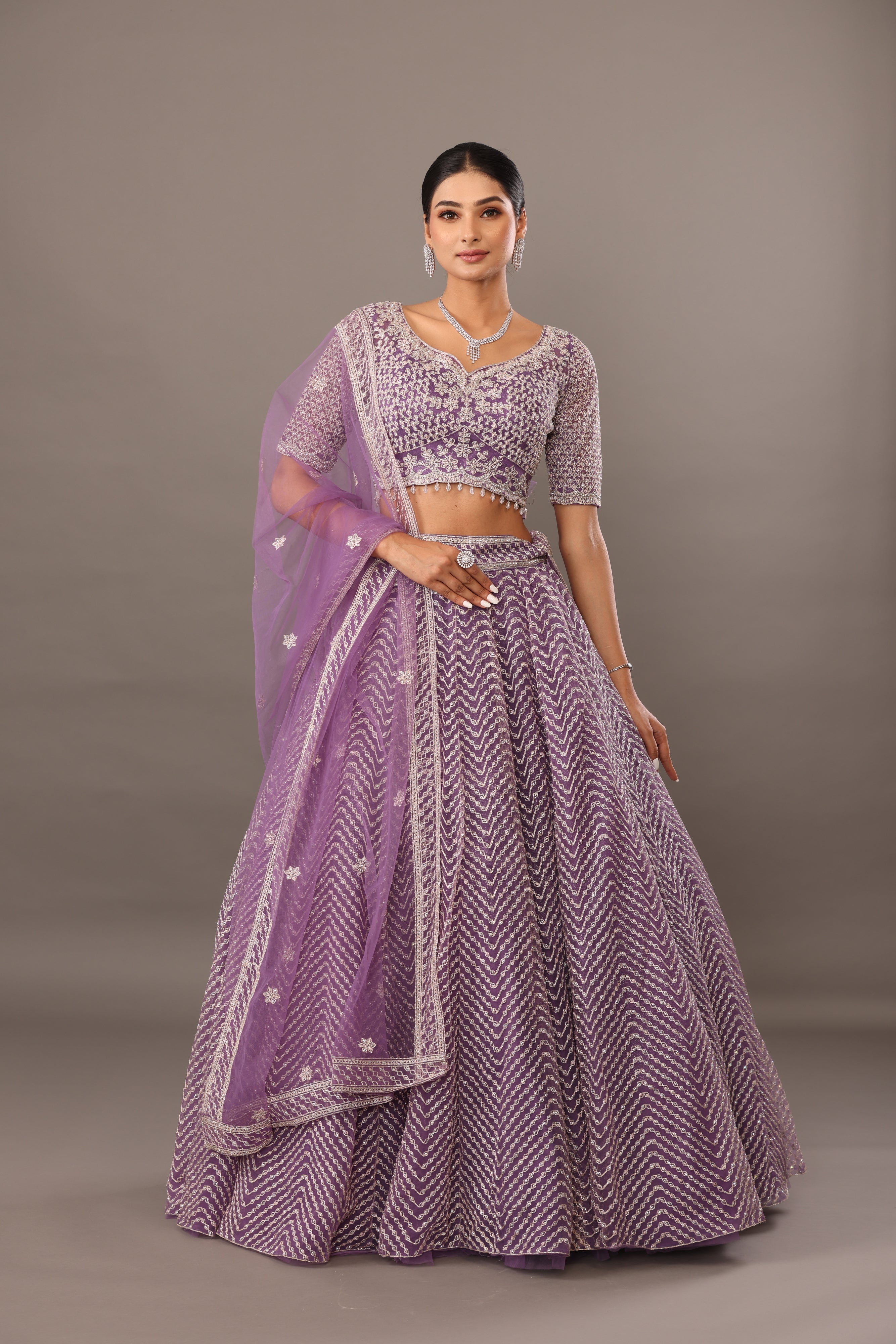Lilac net base lehenga with embellishments