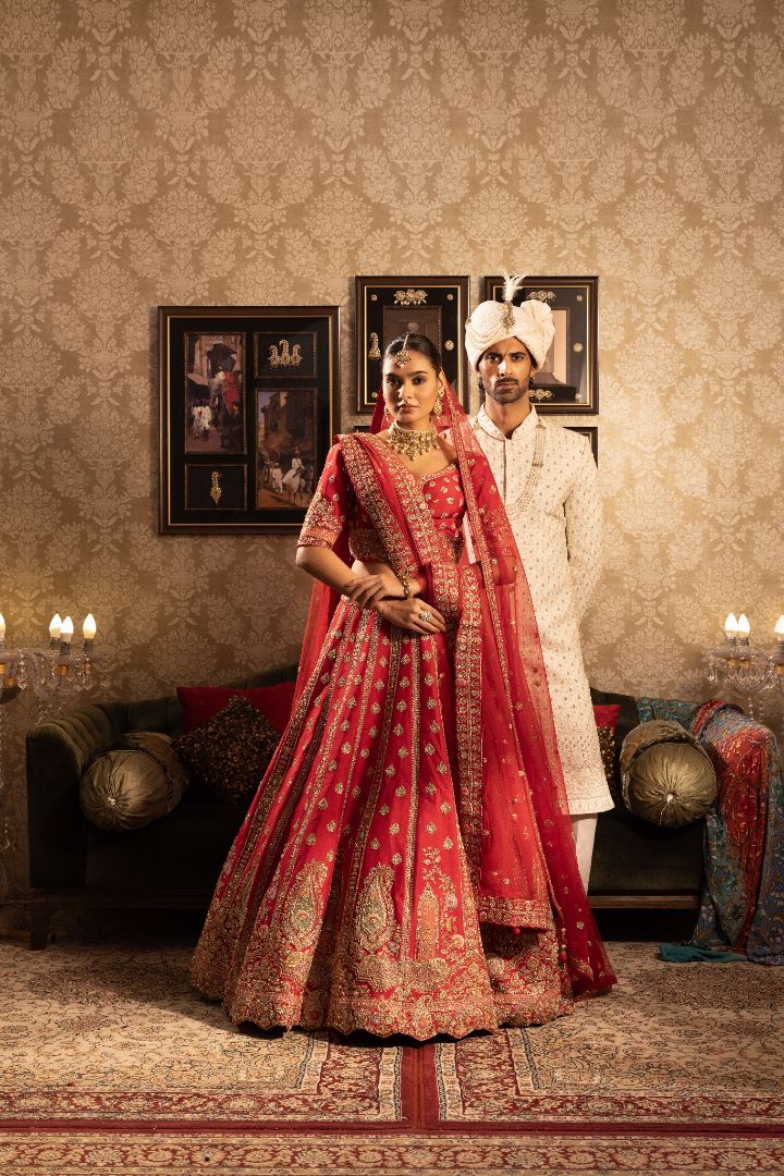 Red Silk Bridal lehenga with paisely Butis