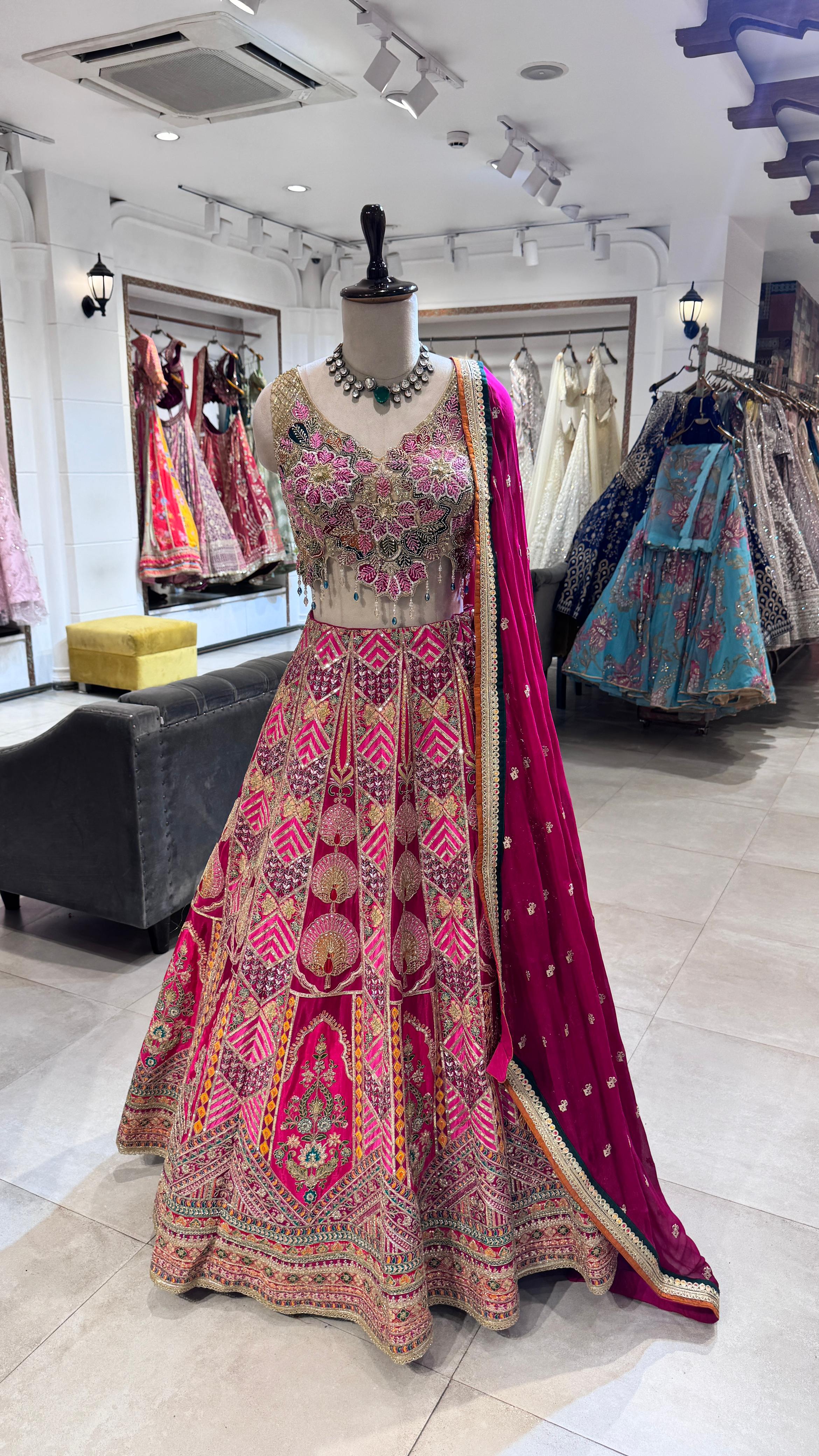 Colorful traditional outfit on a mannequin in a store setting