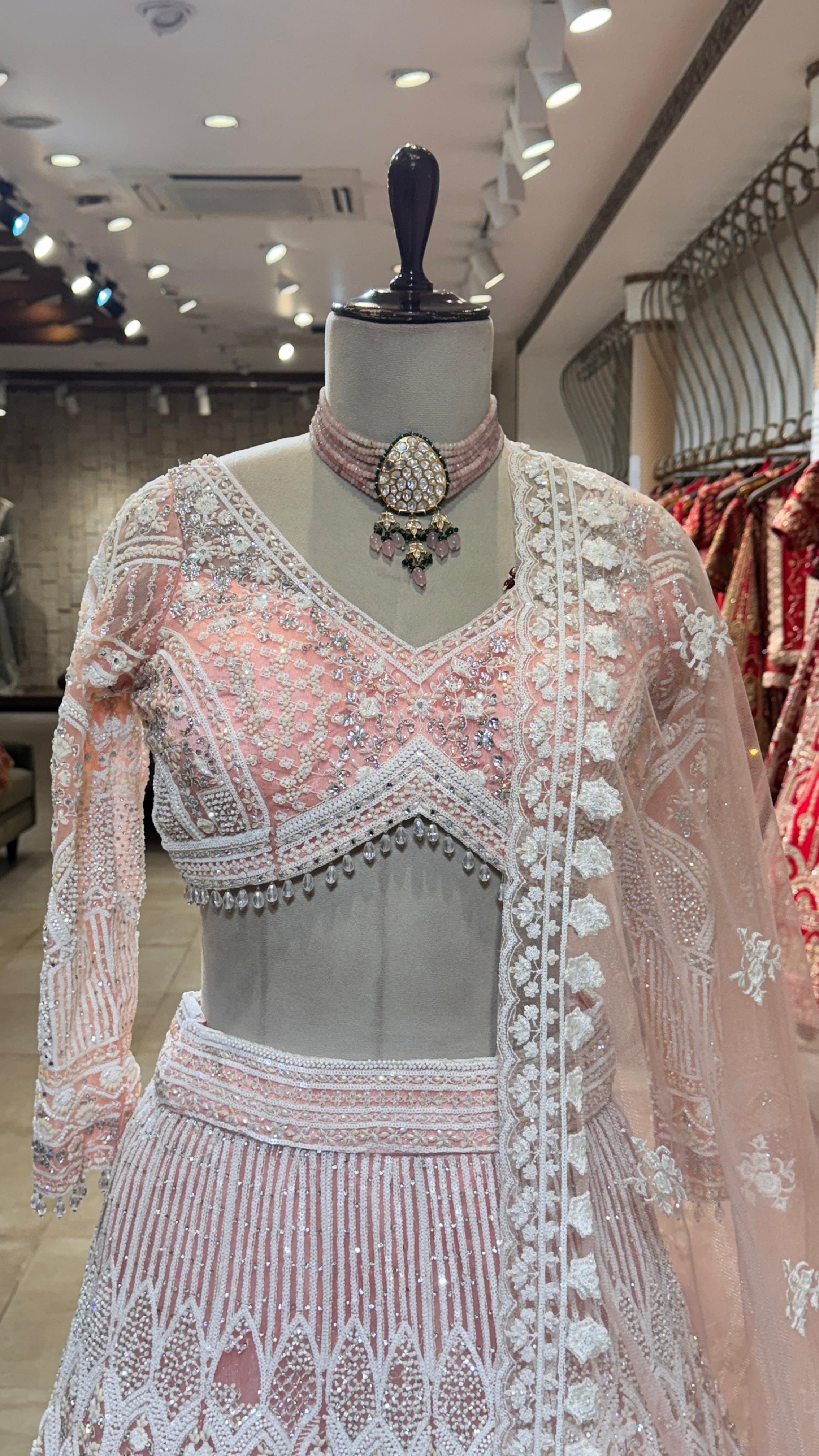 Peach white embroidery lehenga