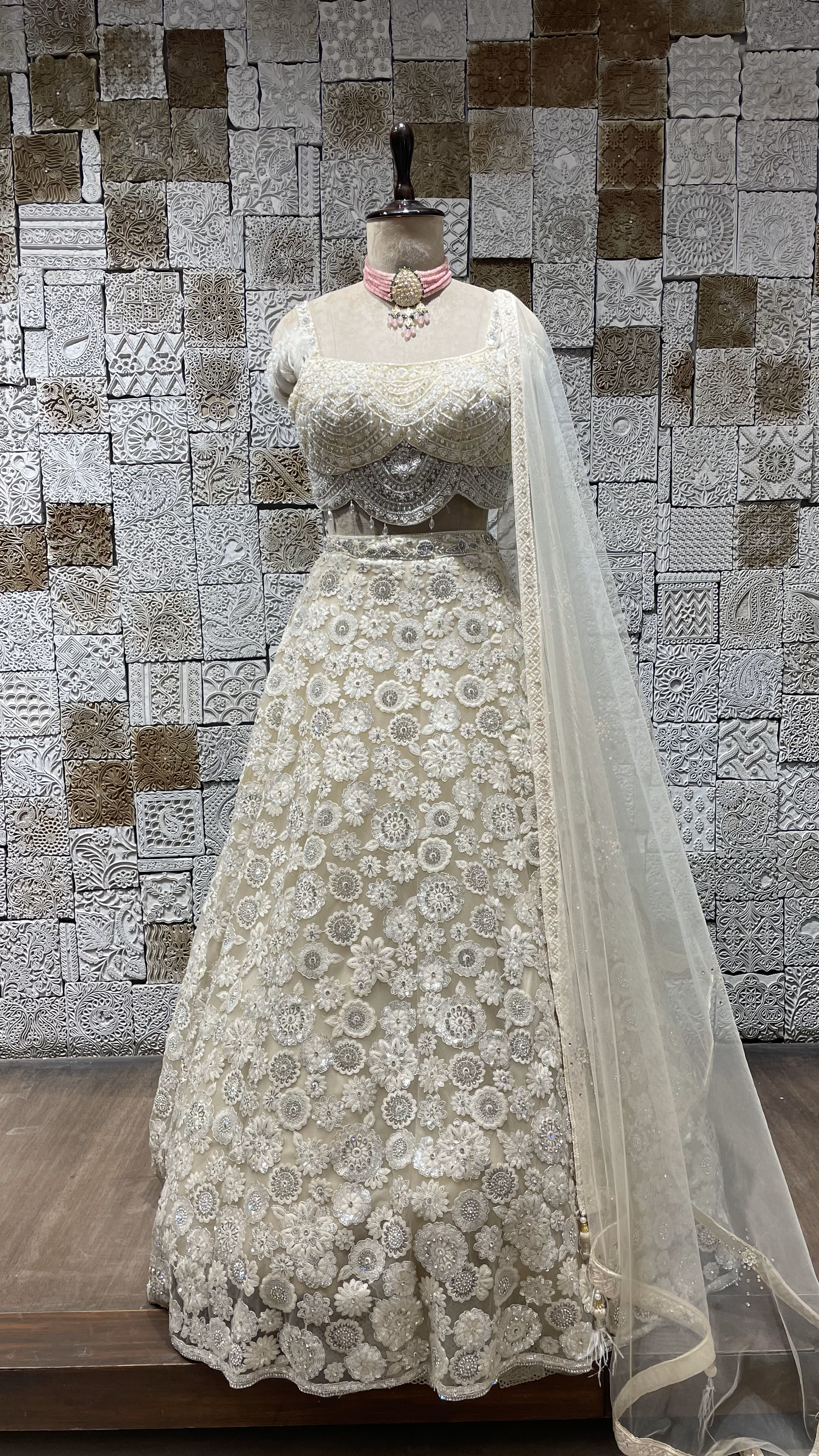 Ivory handwork embellished lehenga with cutdana and heavy latkans