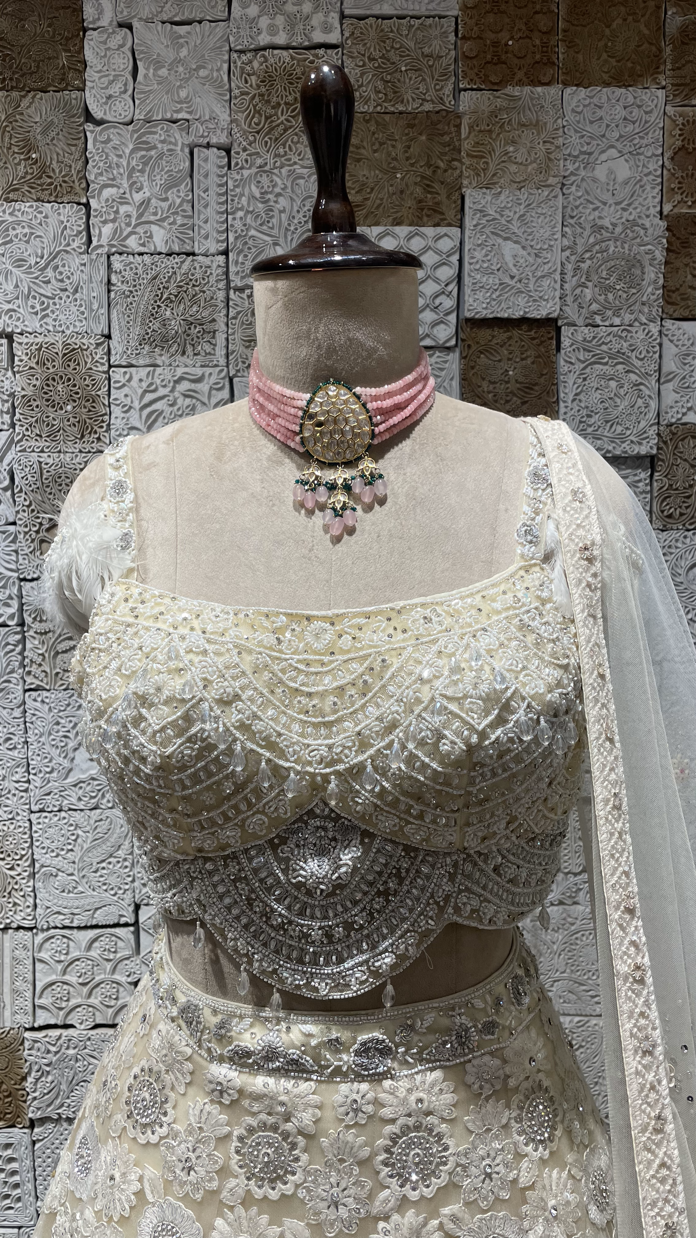 Ivory handwork embellished lehenga with cutdana and heavy latkans