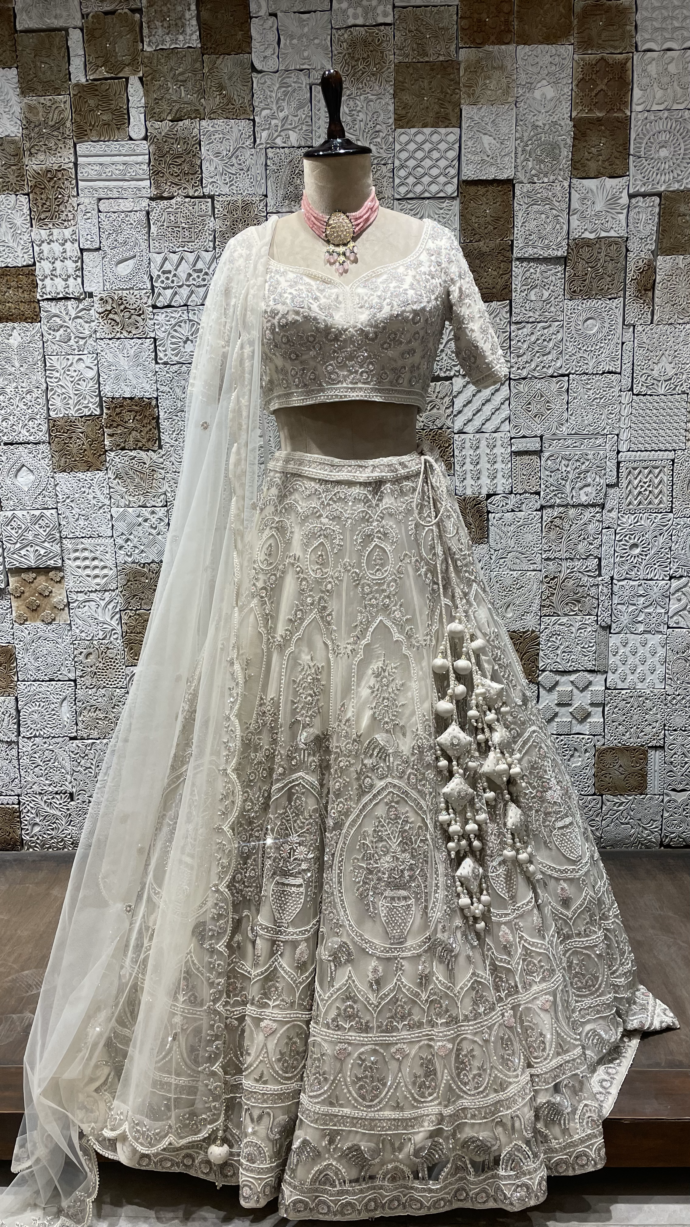 Ivory handwork embellished lehenga with cutdana and heavy latkans