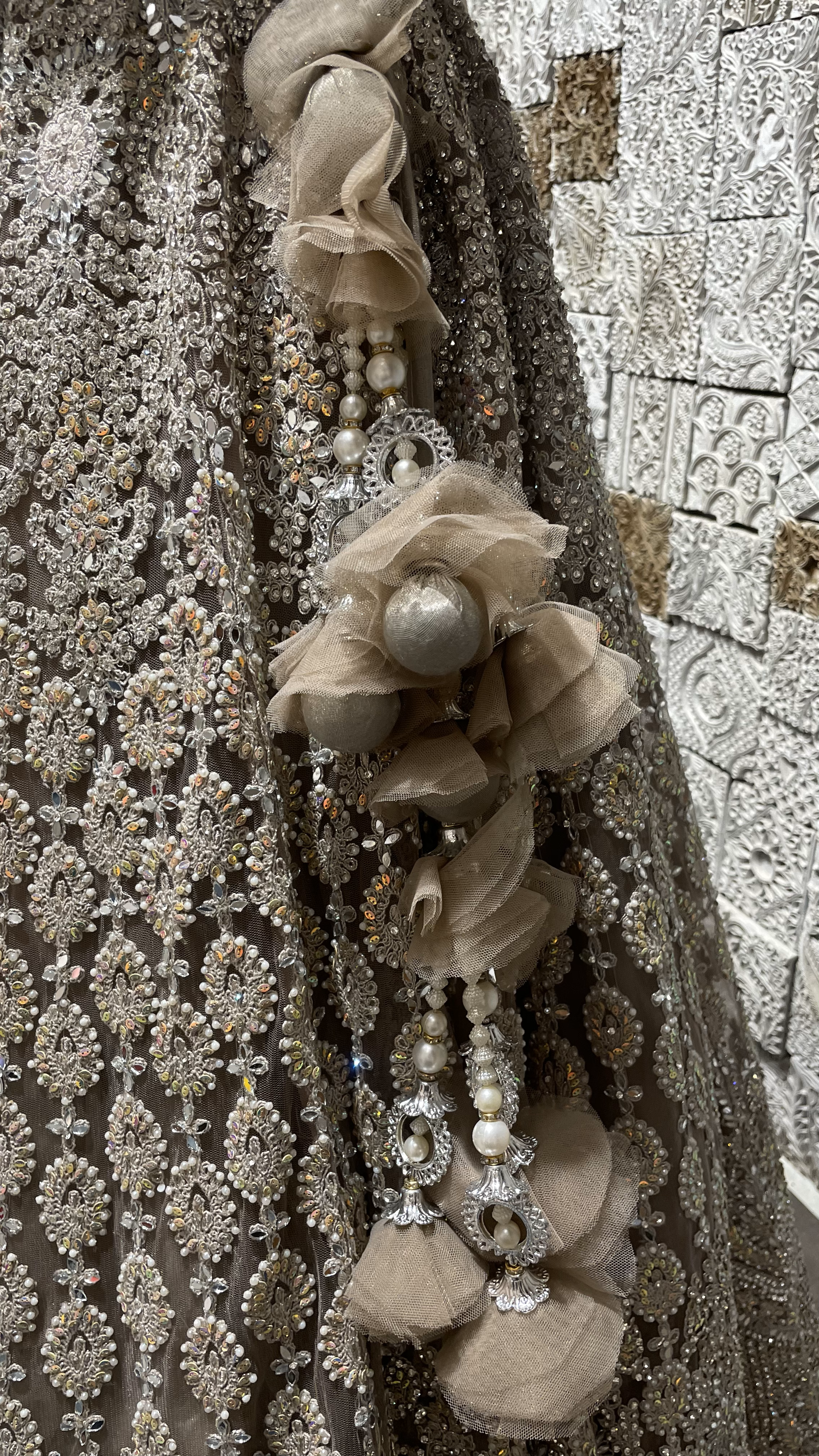 Beige mirrorwork lehenga on a net base