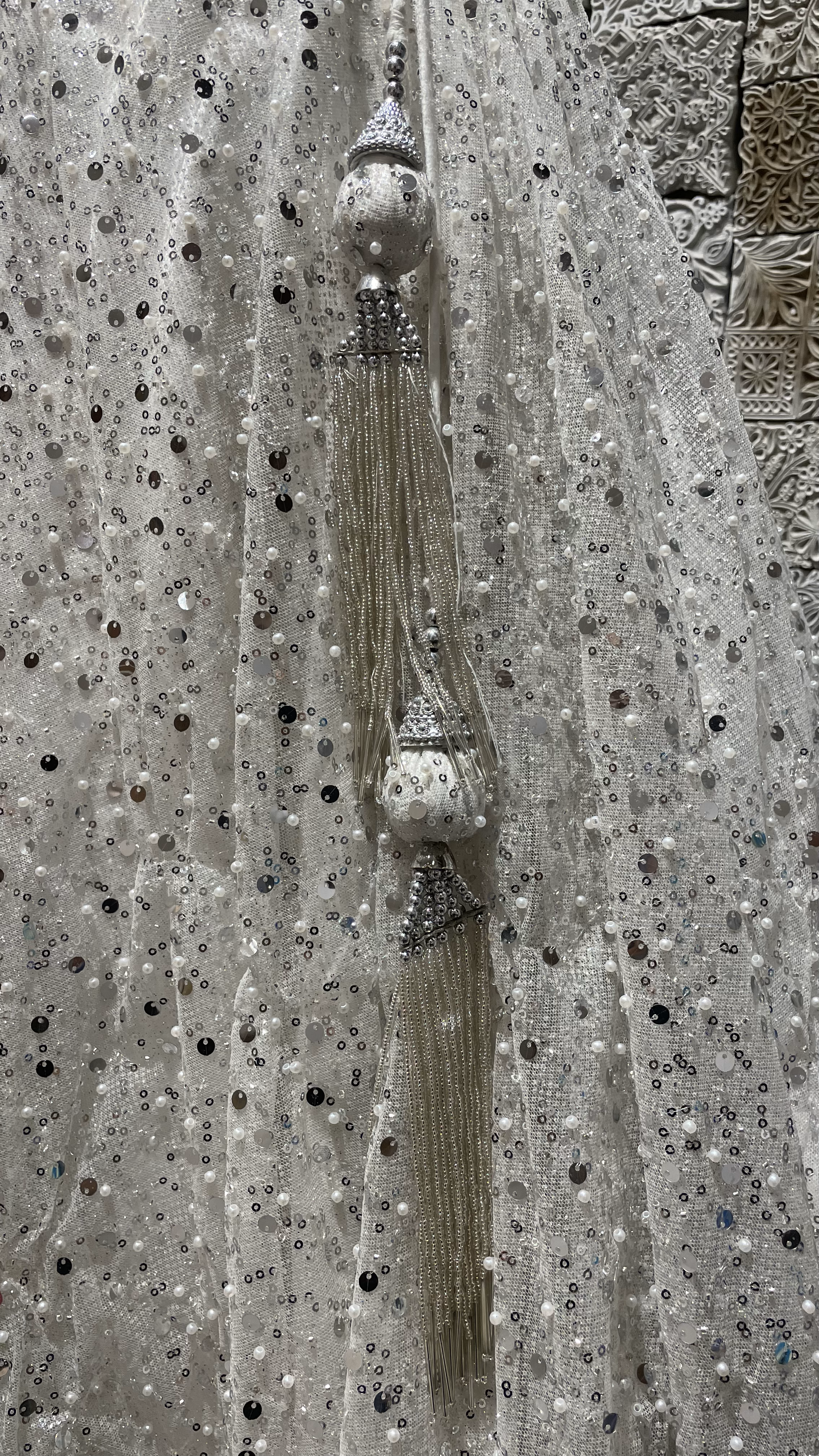 White Net lehenga with heavy embellished blouse