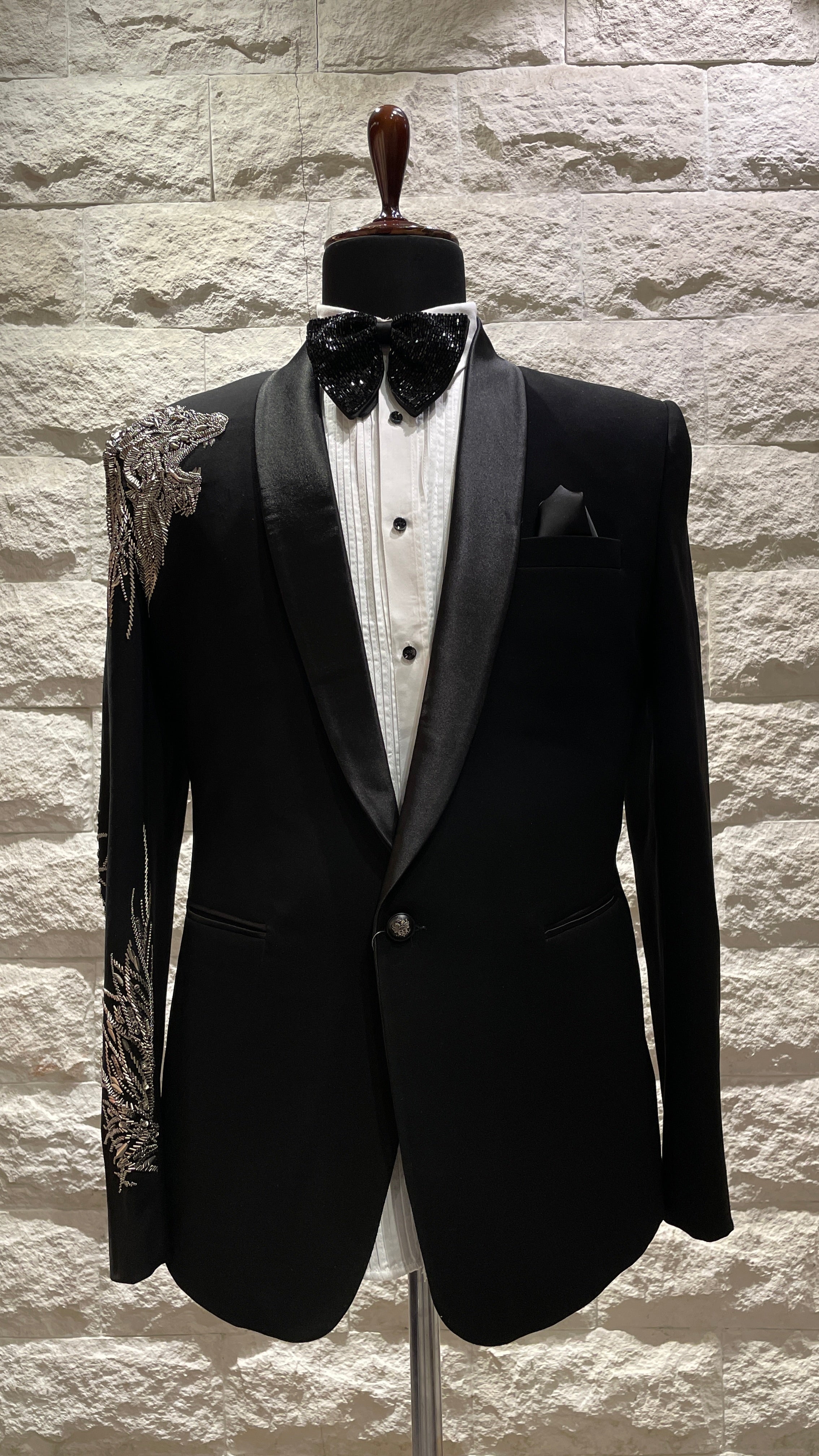 Black tuxedo with statement silver motif