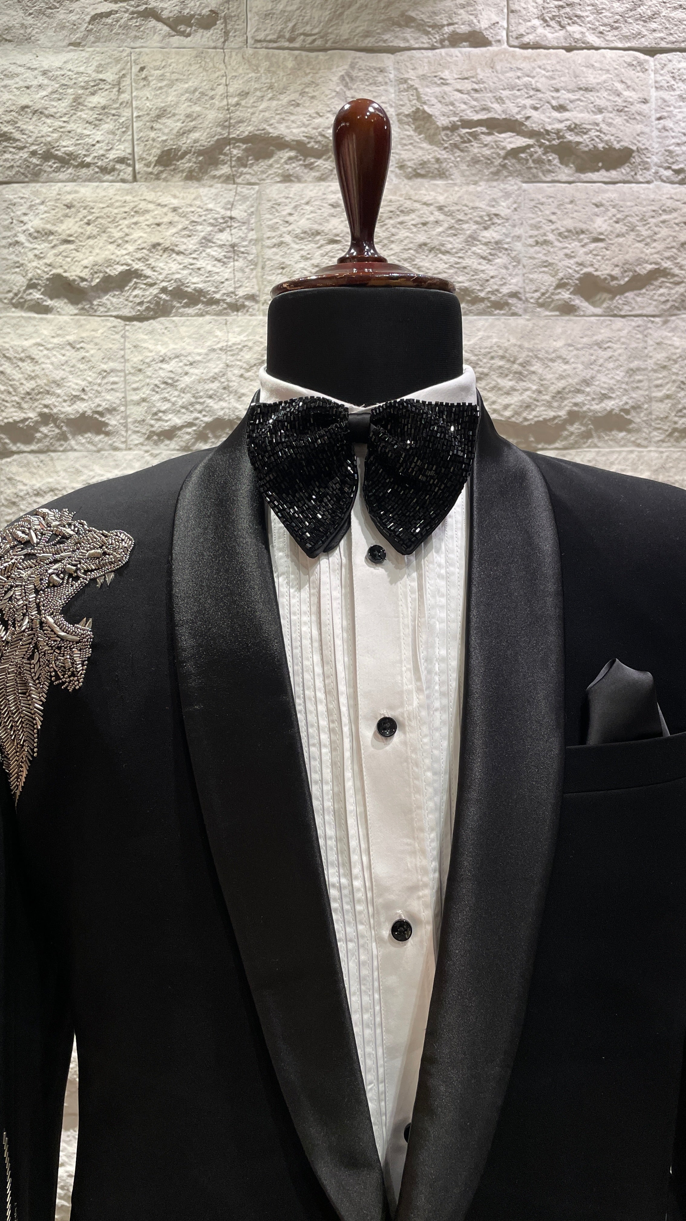 Black tuxedo with statement silver motif