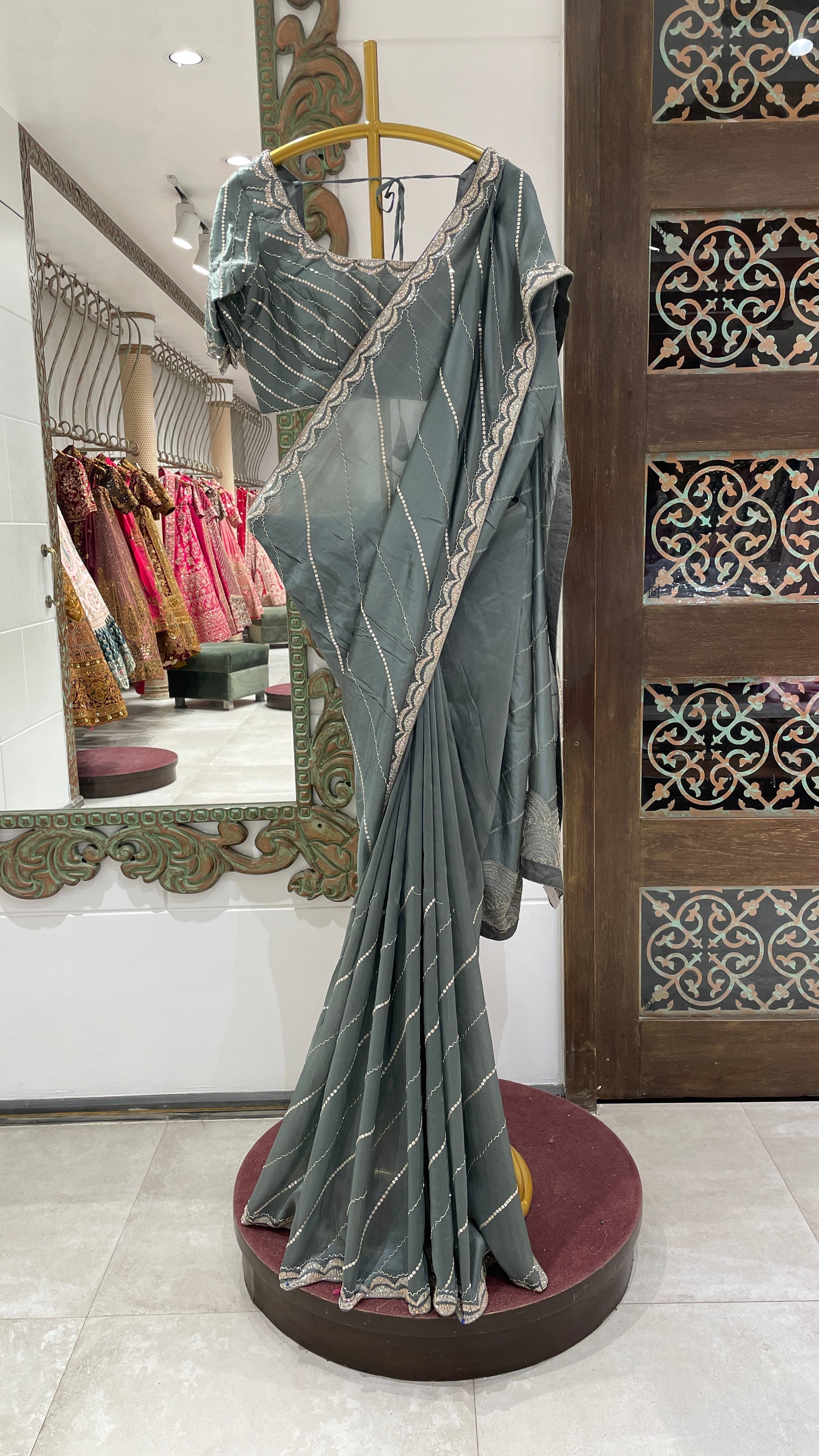 Grey organza saree with cutdana embellishment
