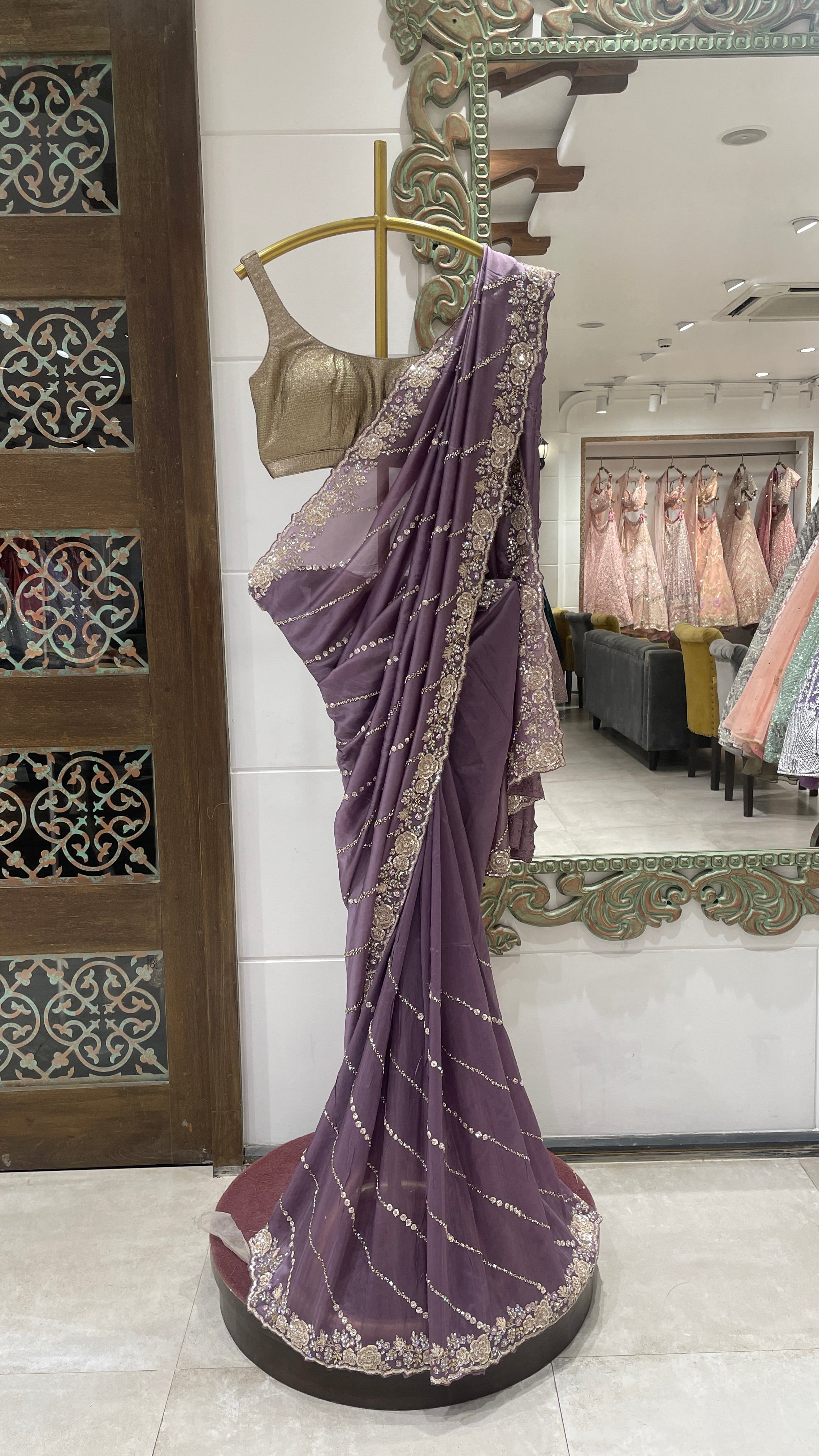 Purple organza saree with floral motifs