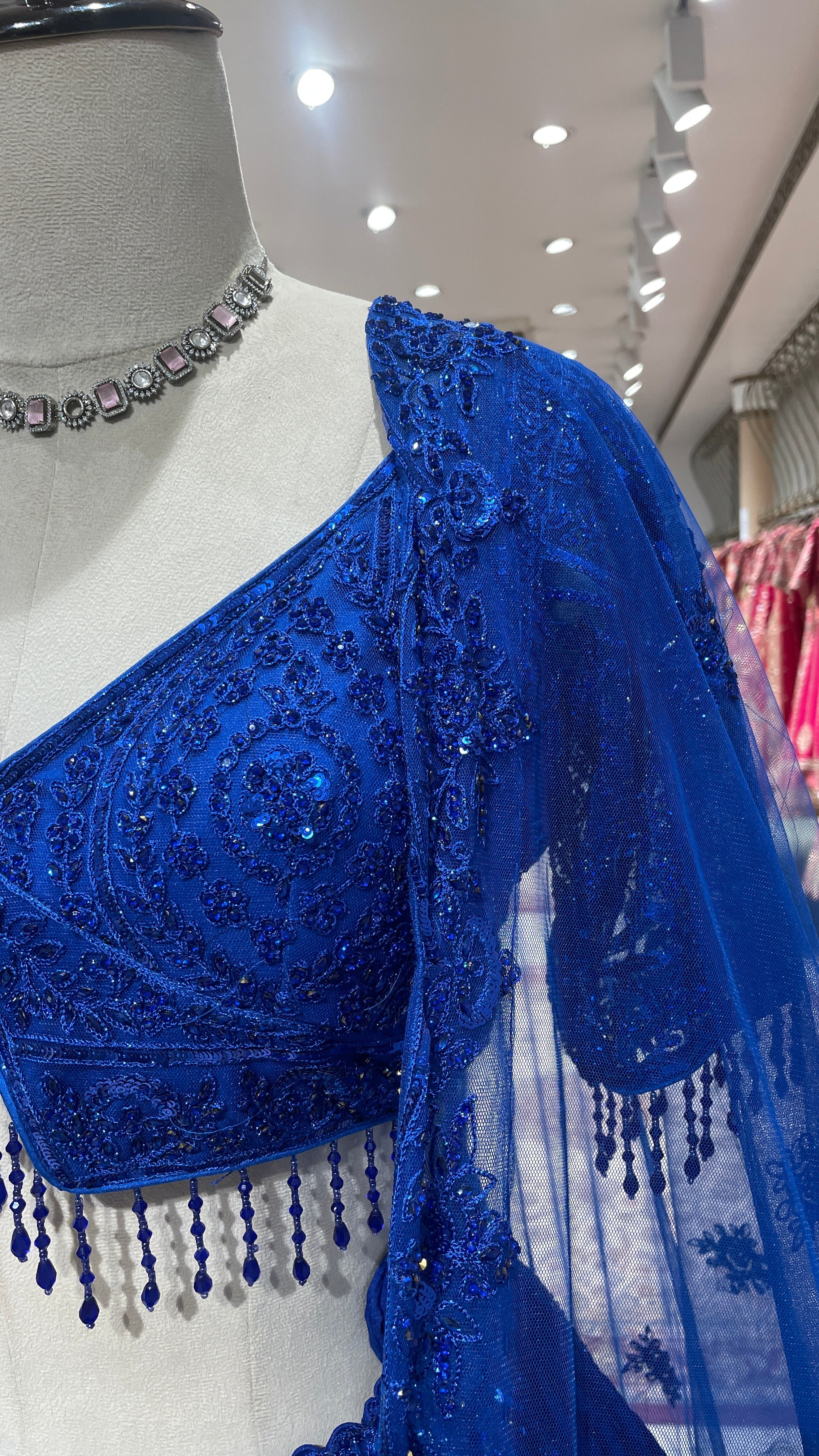 Royal blue net lehenga with threadwork and sequin embellishments