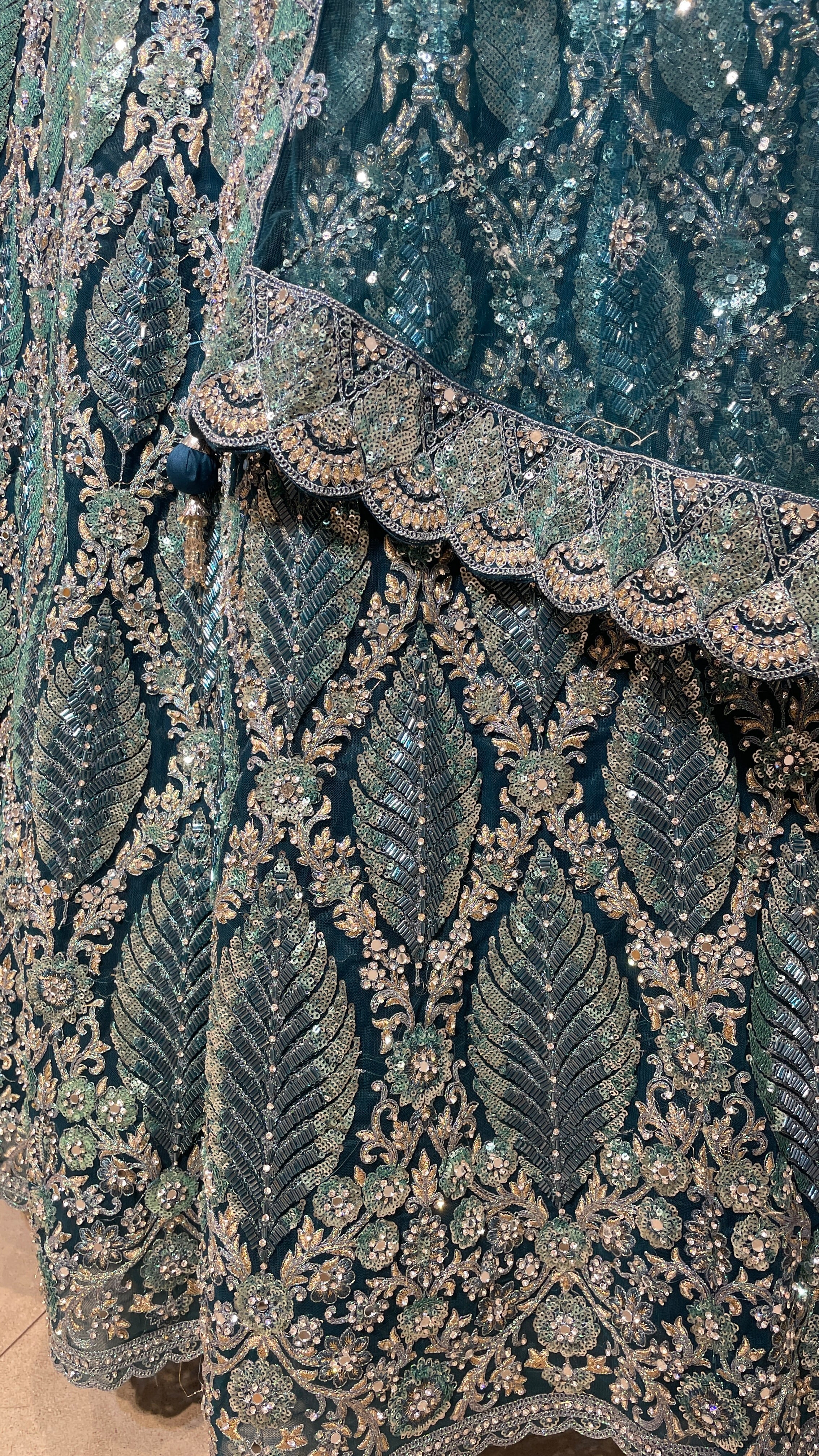 Turquoise blue lehenga with floral motifs