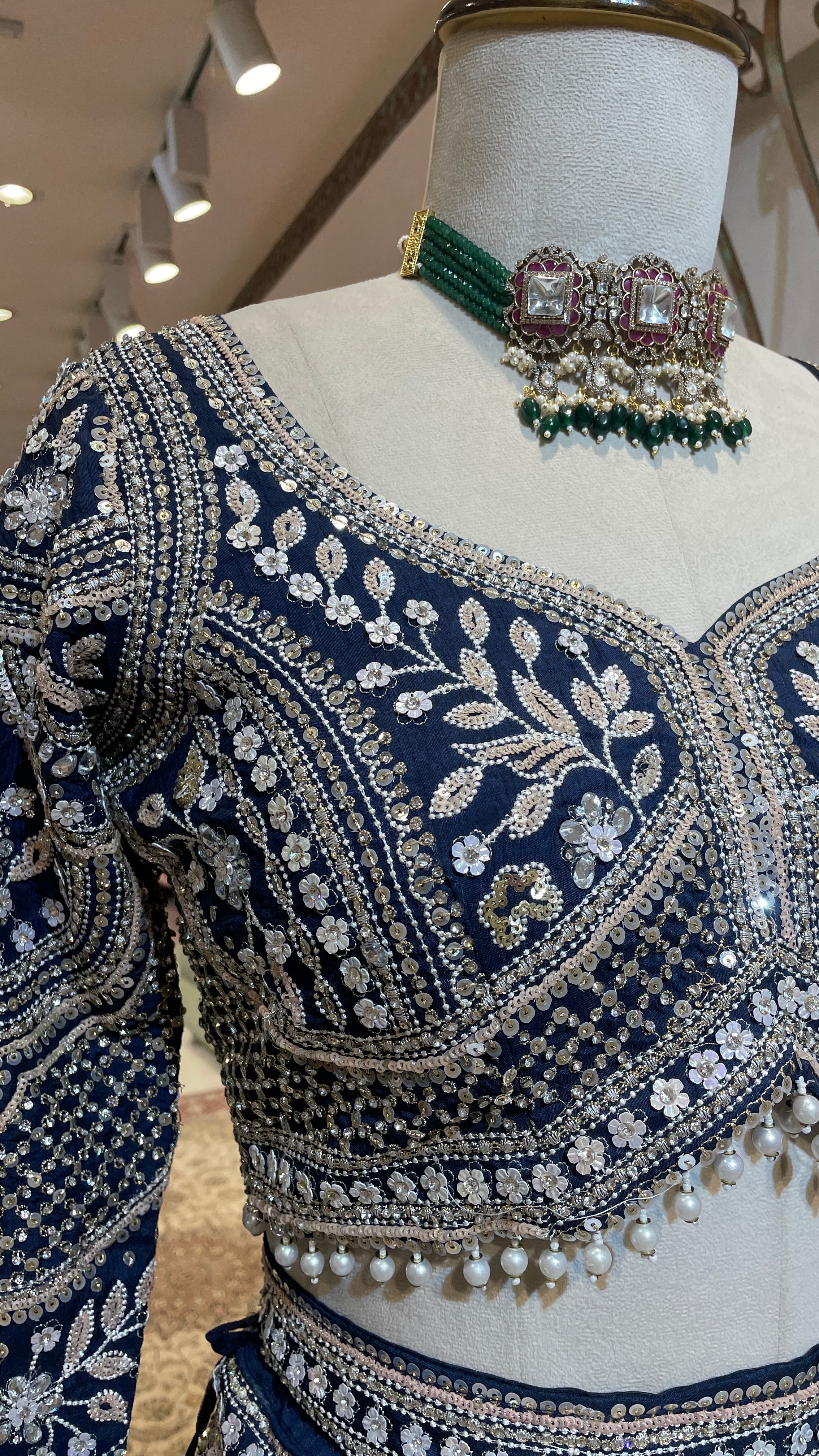 Royal blue silk lehenga with sequins and floral motifs