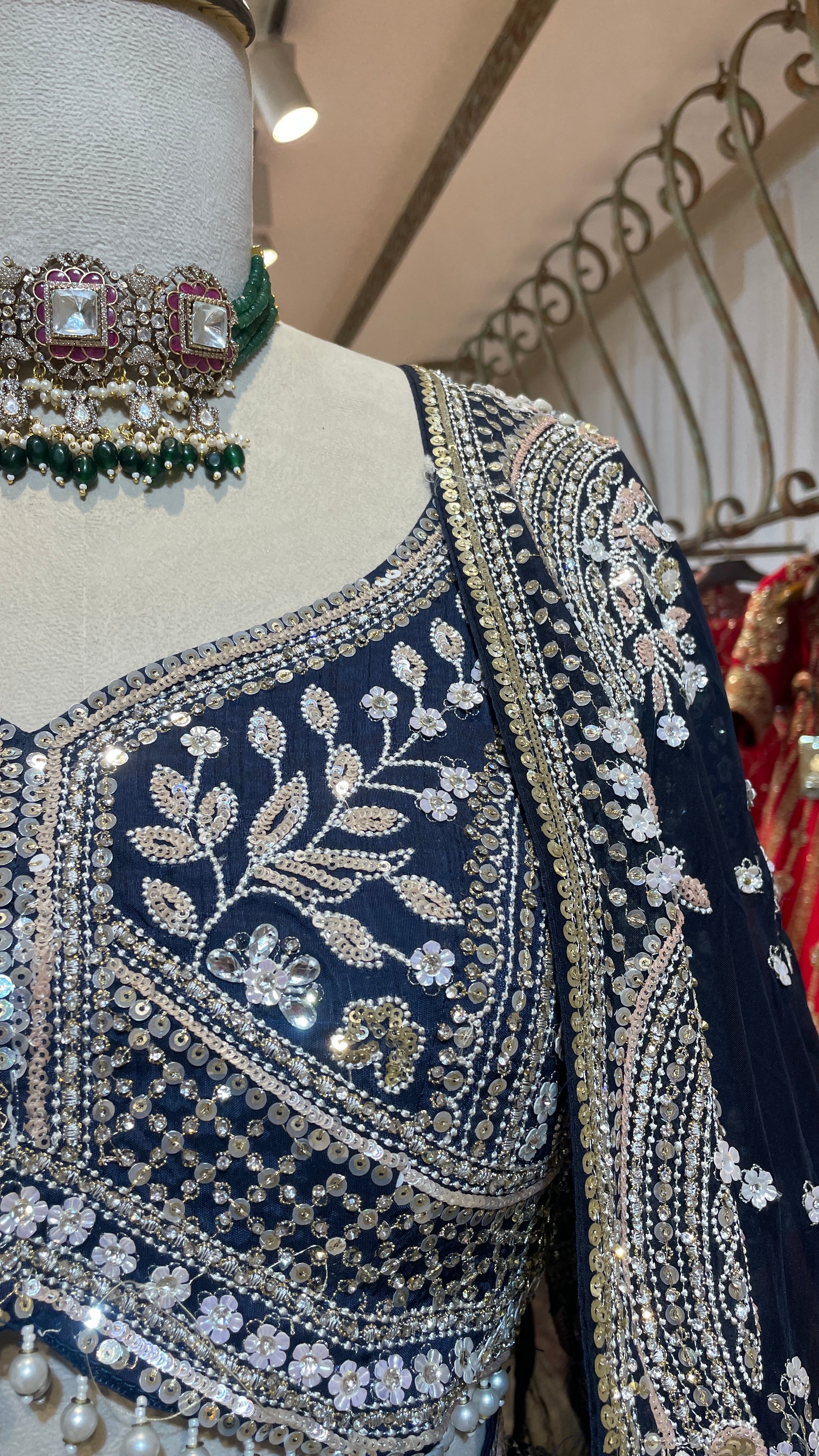 Royal blue silk lehenga with sequins and floral motifs