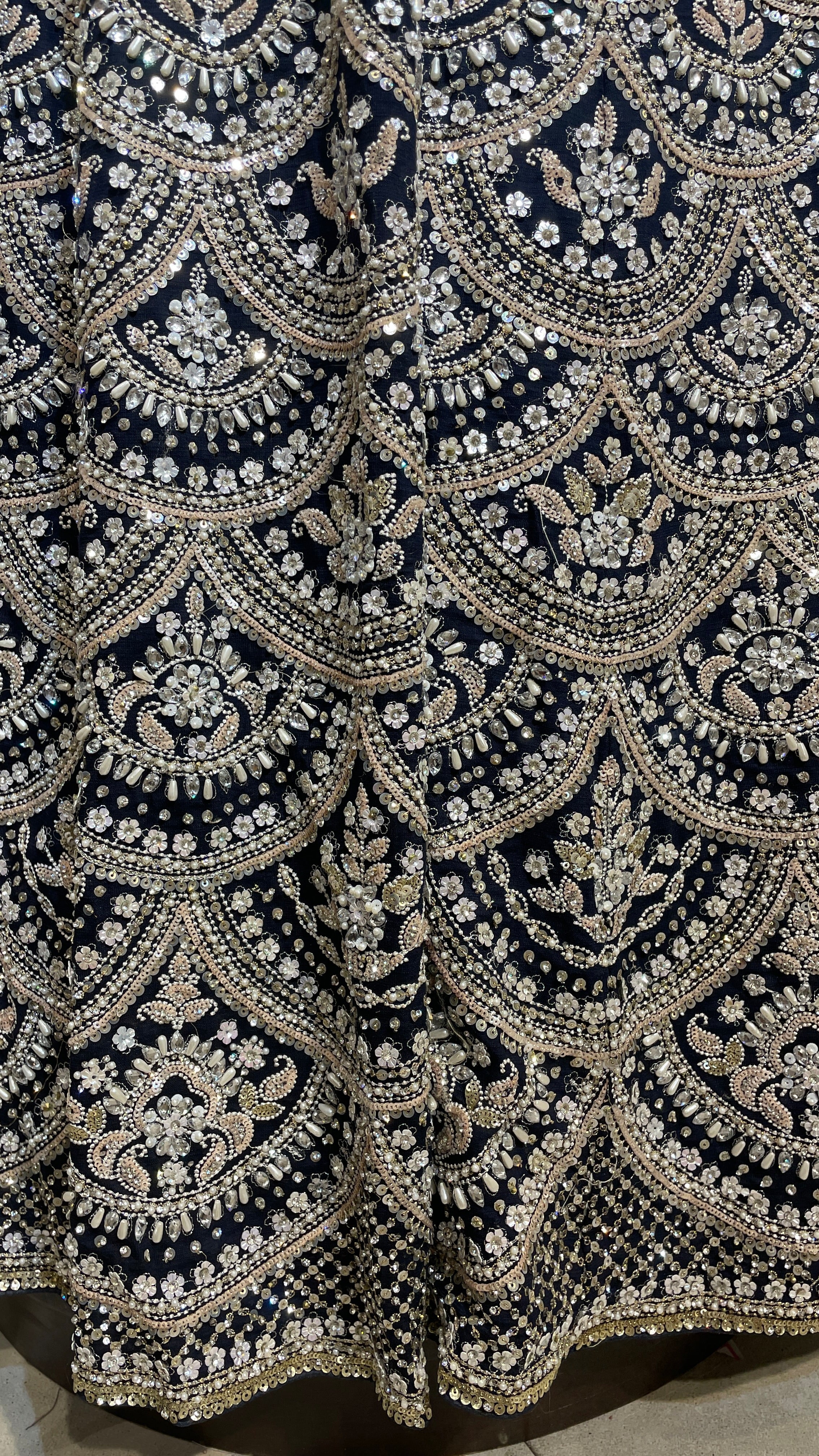 Royal blue silk lehenga with sequins and floral motifs