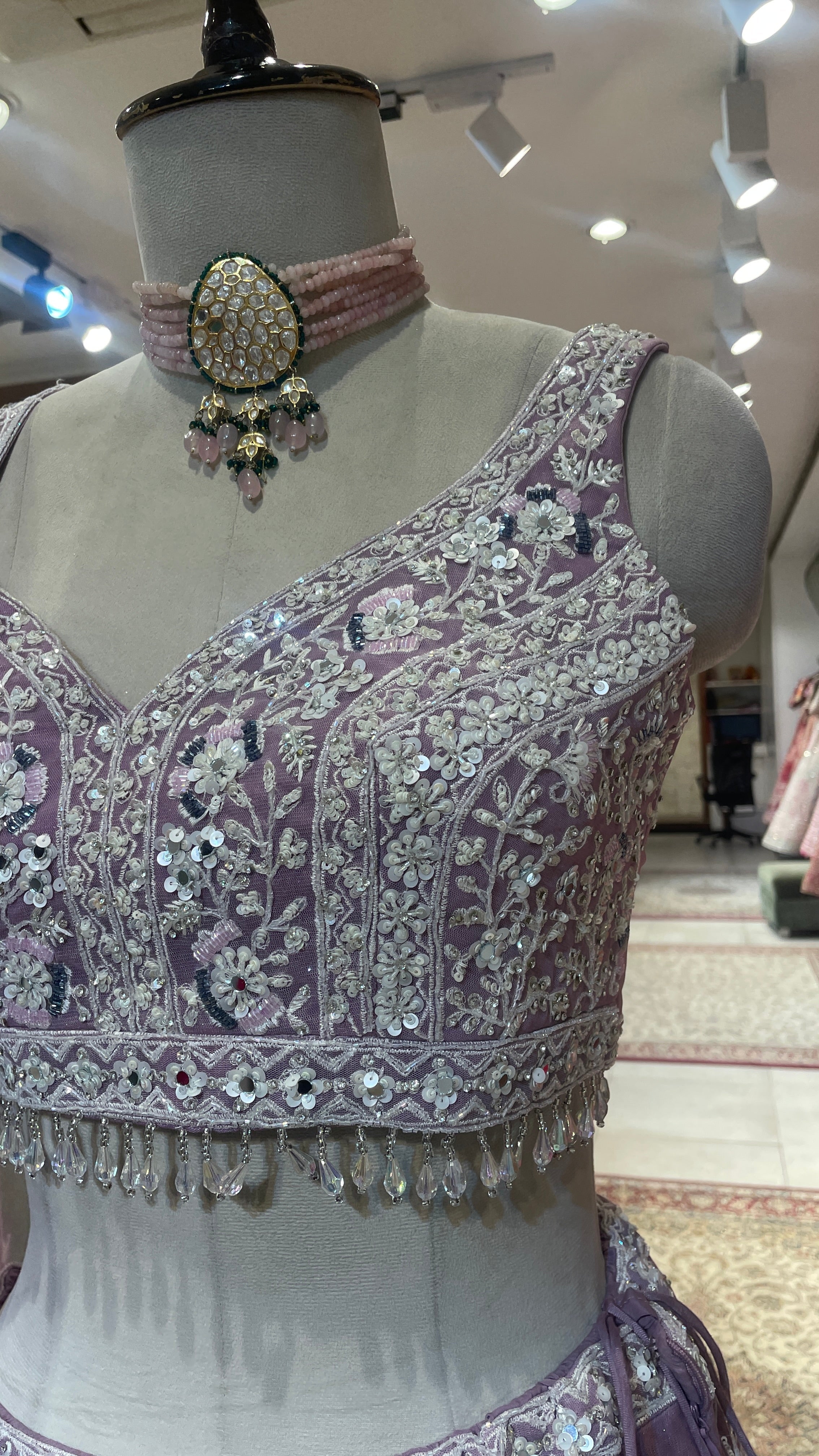 Lavender net lehenga with sequins cutdana and threadwork