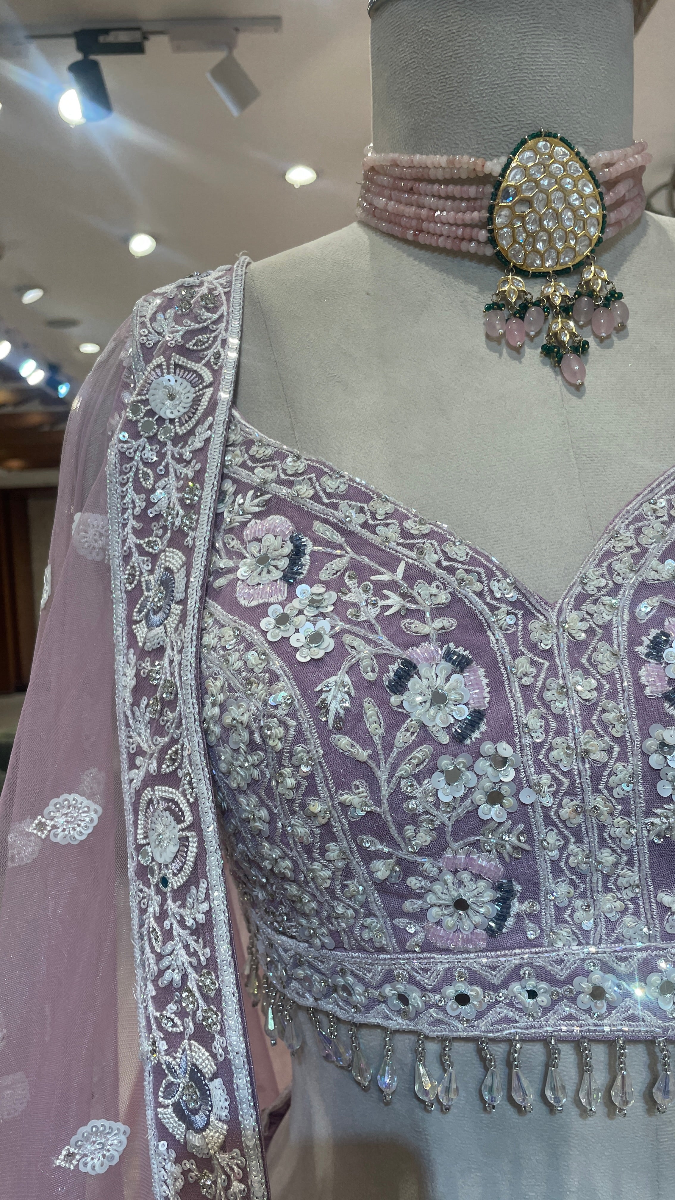 Lavender net lehenga with sequins cutdana and threadwork