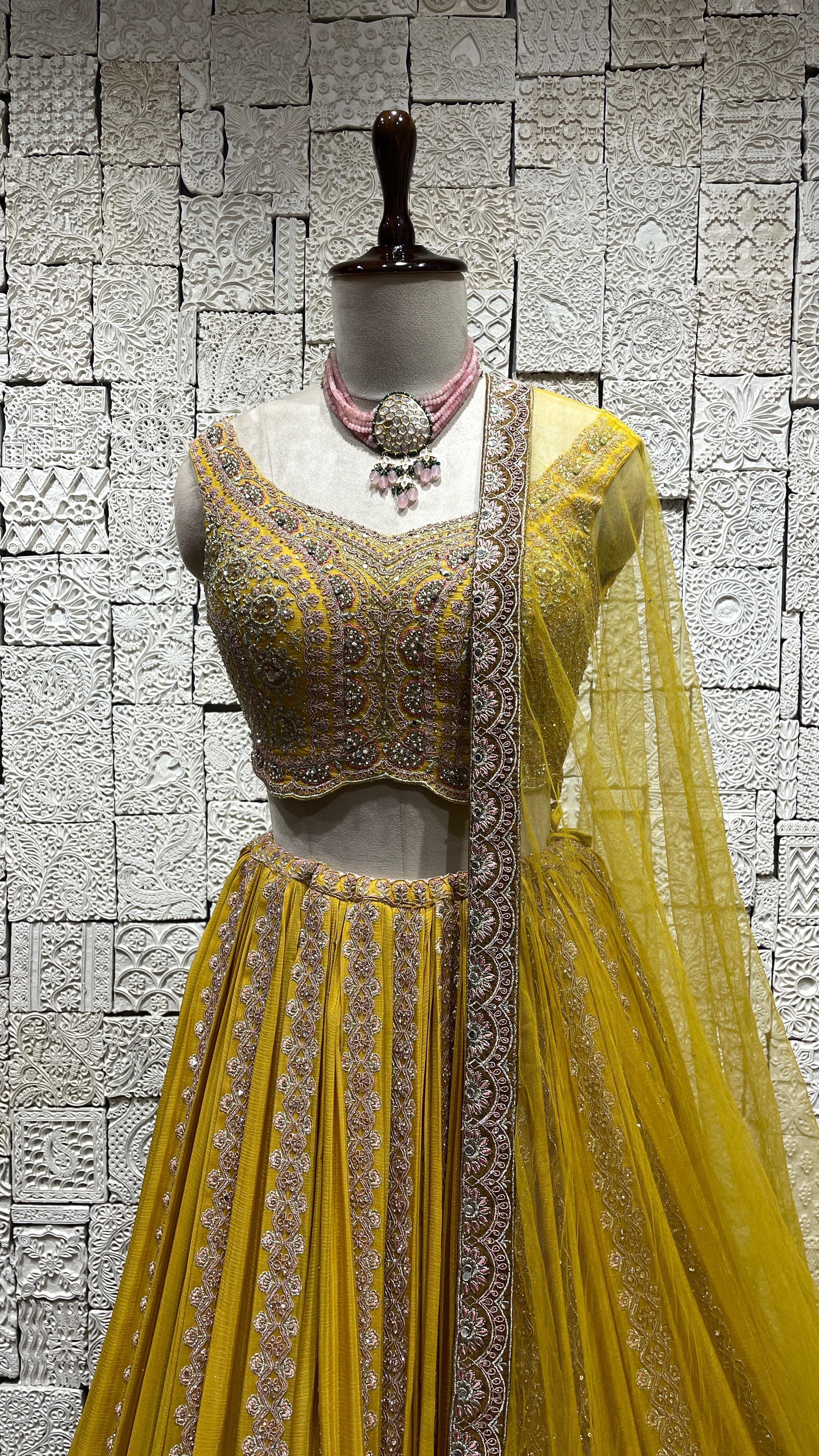 Yellow Georgette lehenga with embellishments