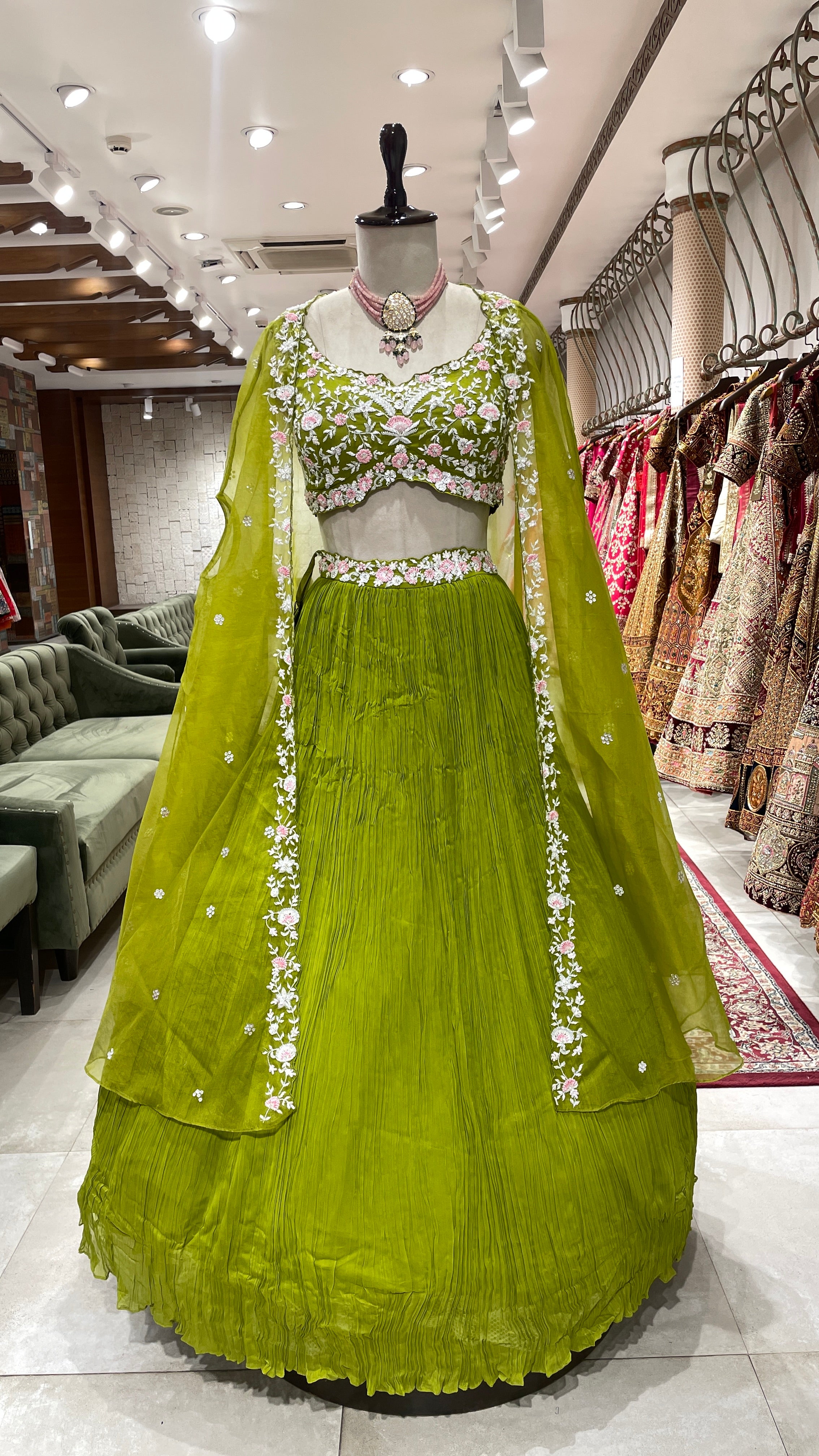 Green cape lehenga with floral motifs