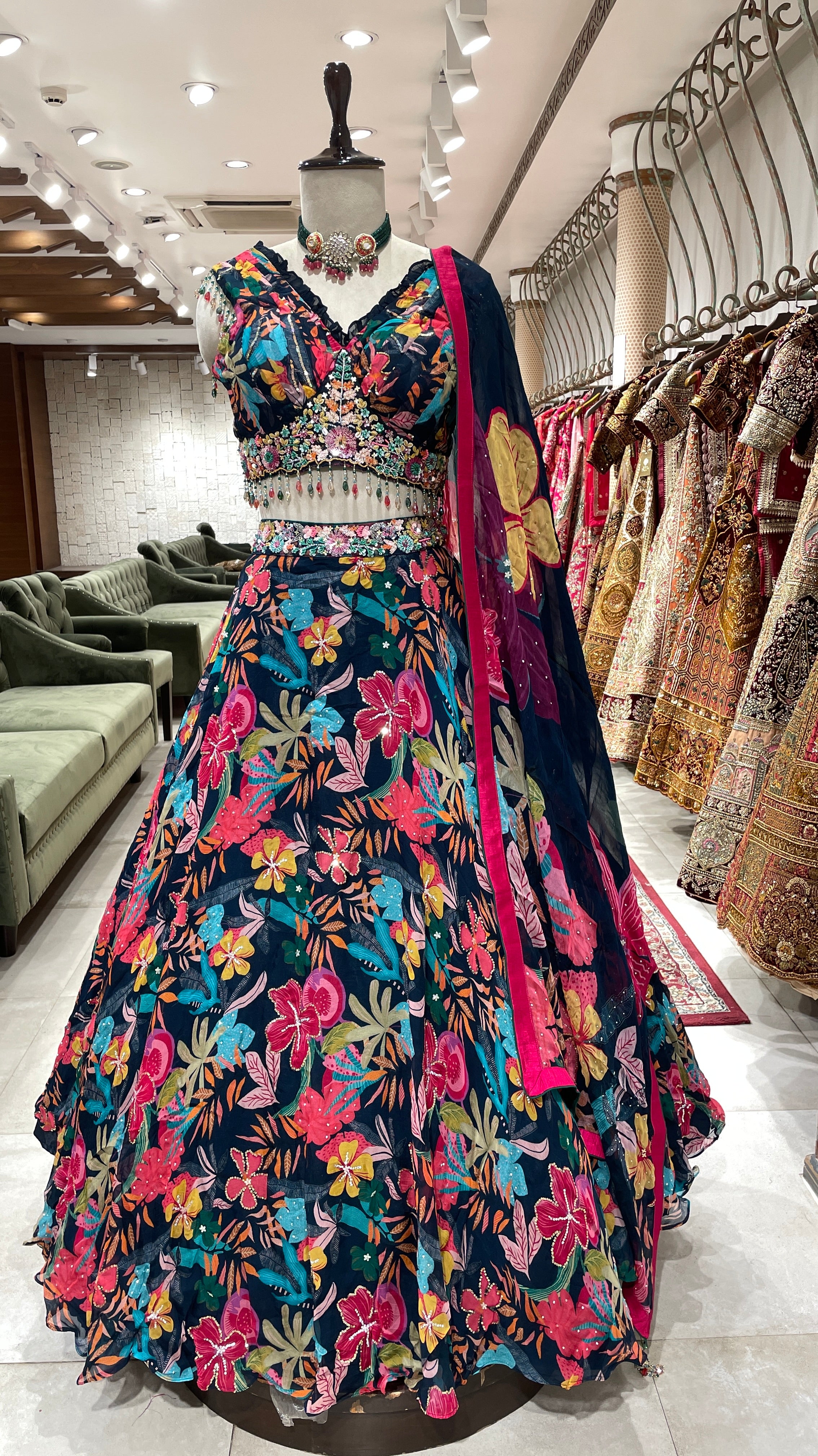 Royal blue organza lehenga with floral motifs