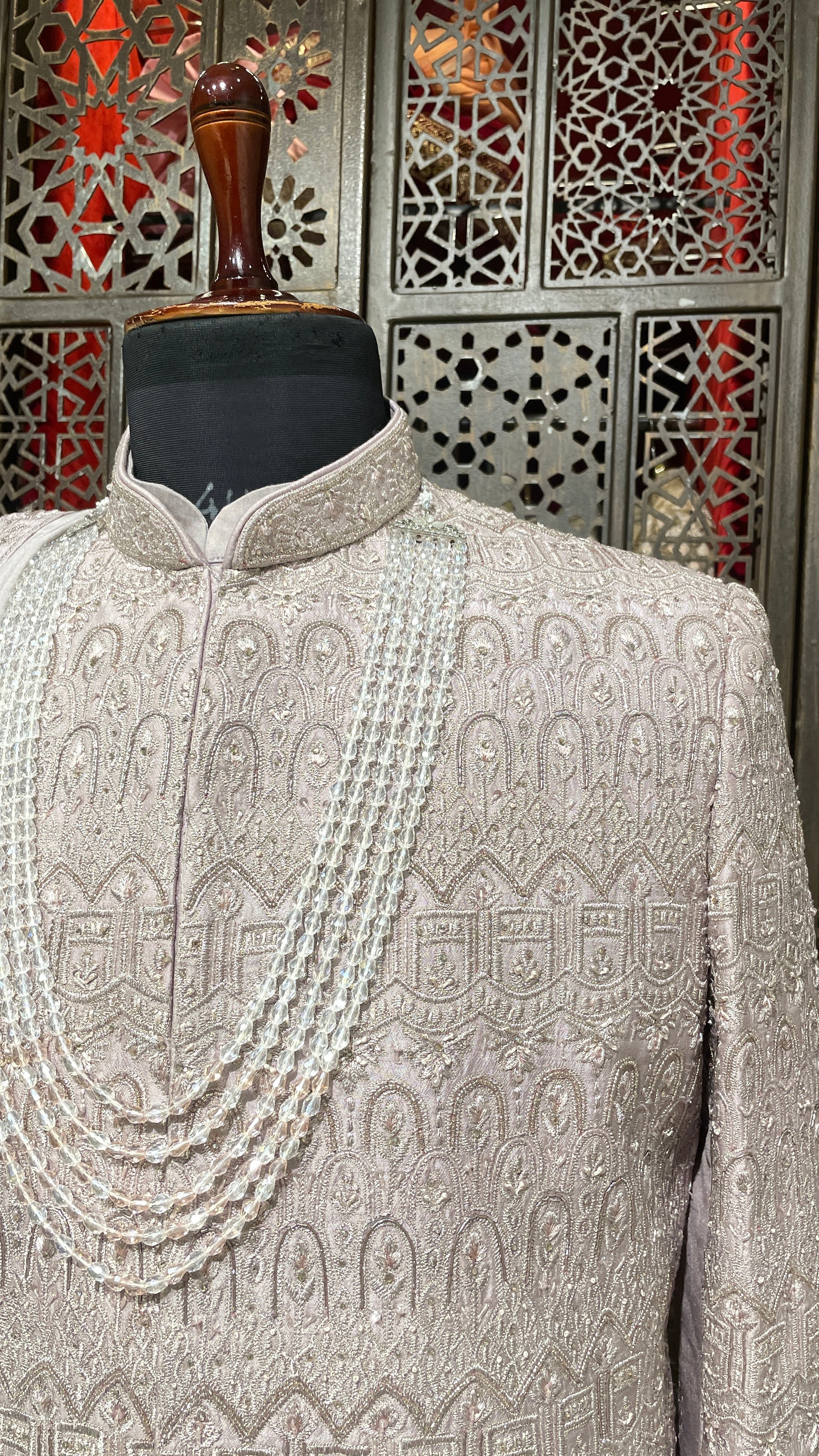 Lilac Anarkali style sherwani with gold embellishment