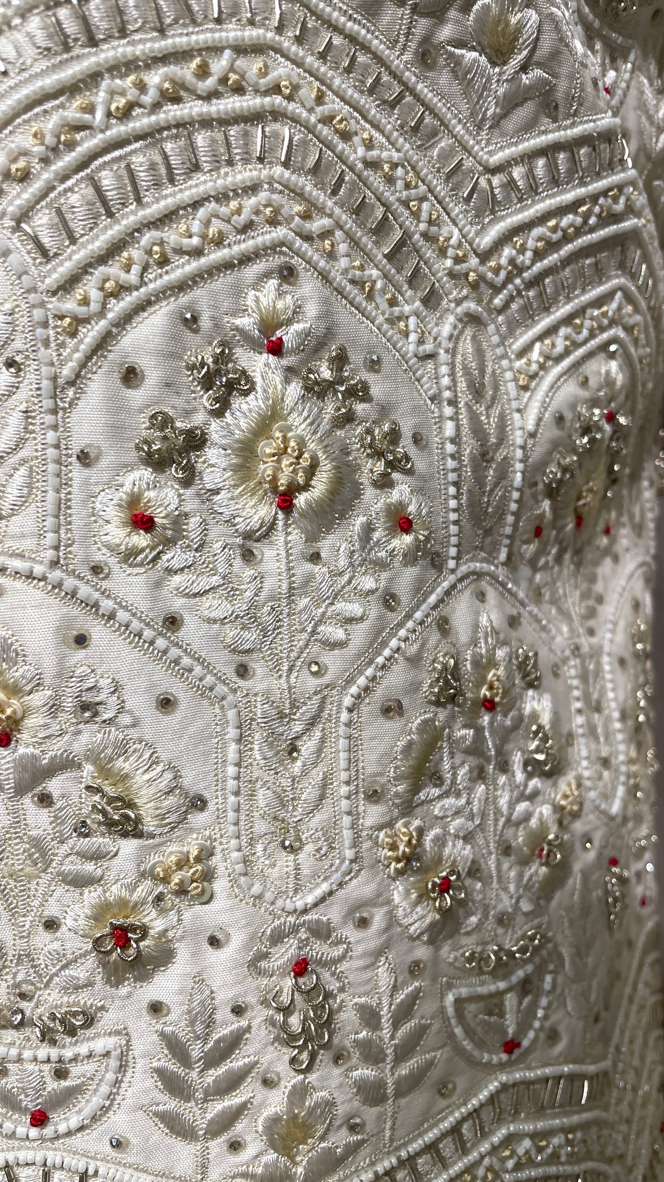 Cream sherwani with Anarkali kurta and zariwork