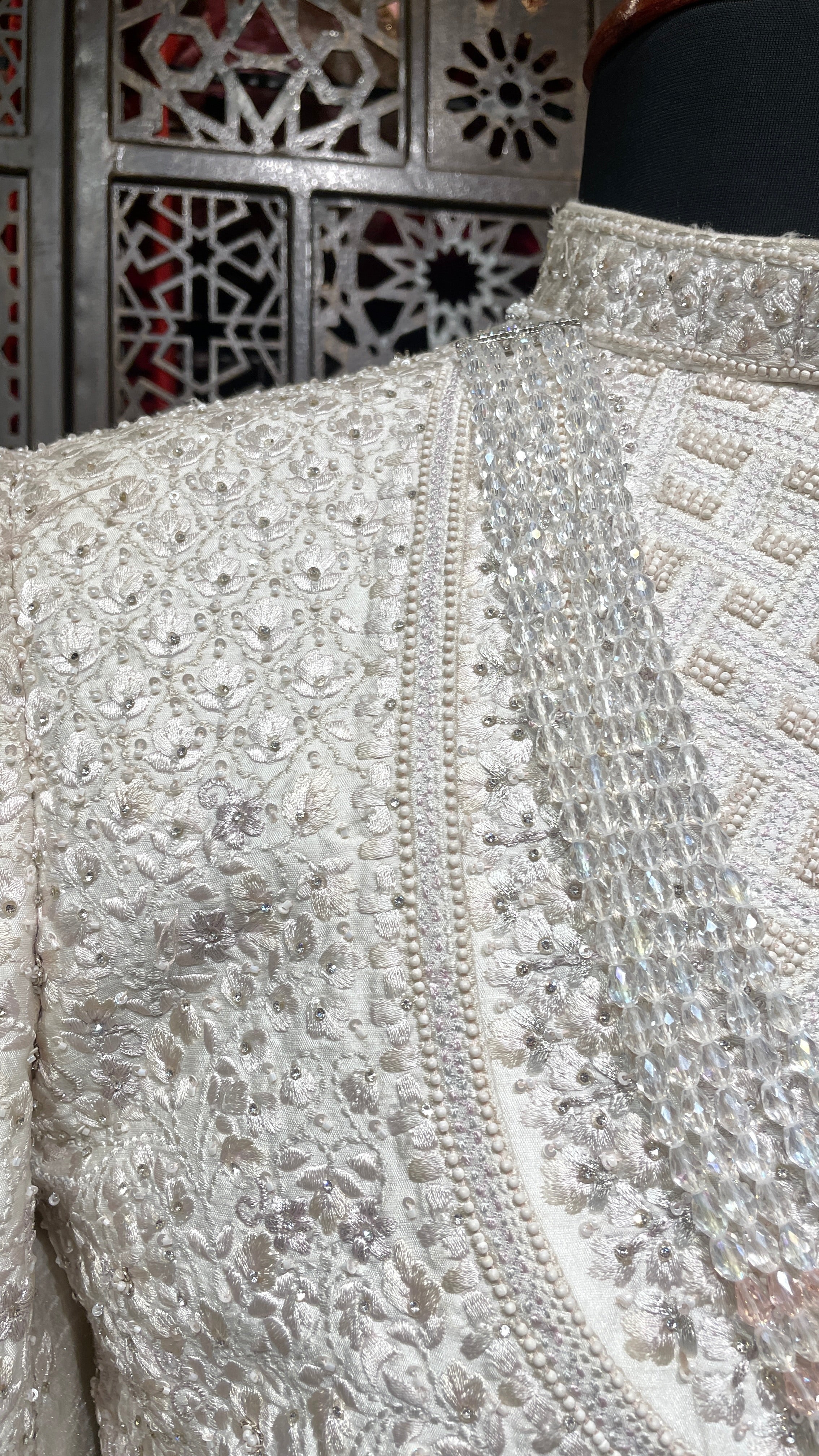 Ivory layered sherwani with threadwork and embellishment