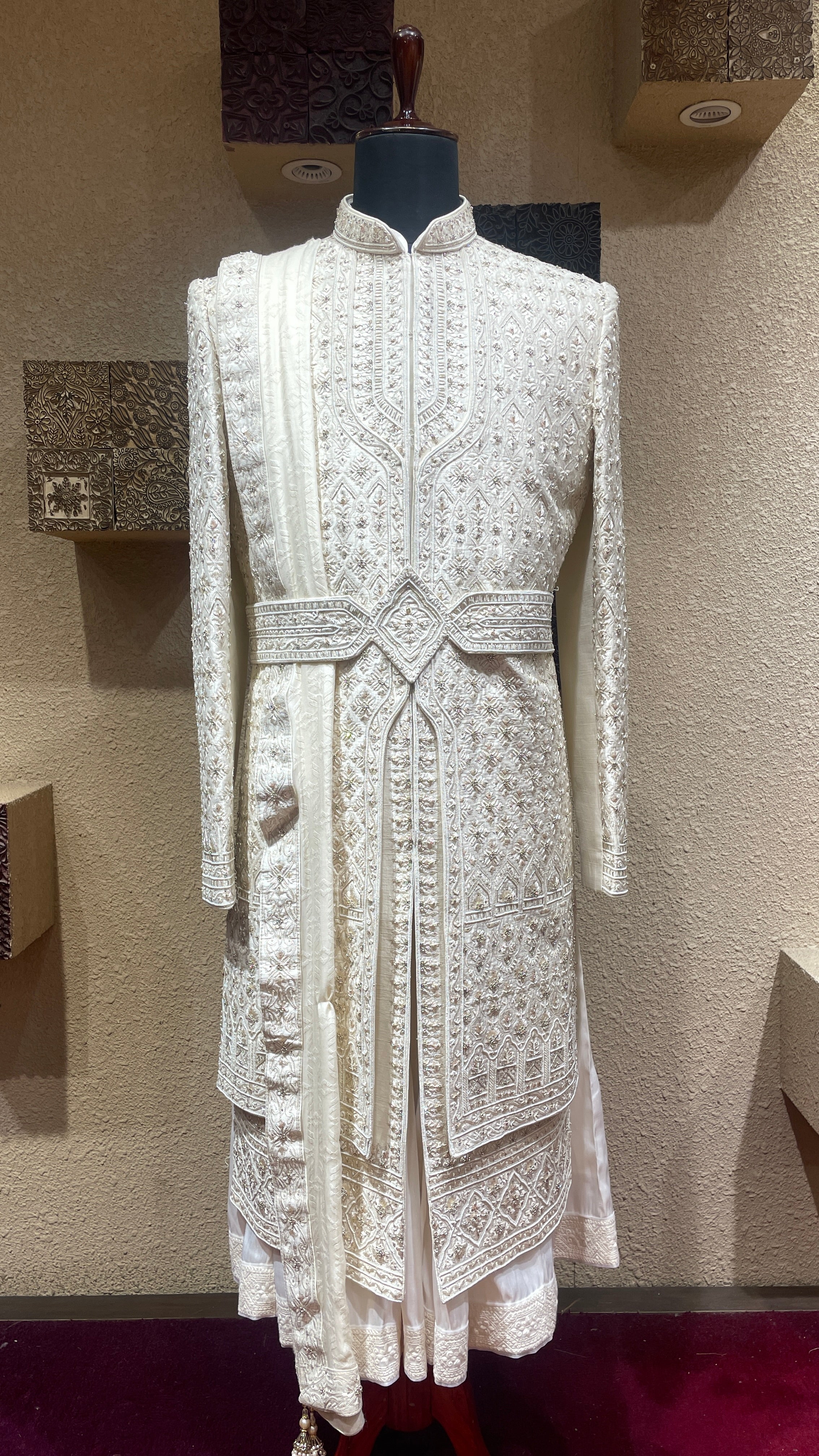 Cream silk layered sherwani with embellishments