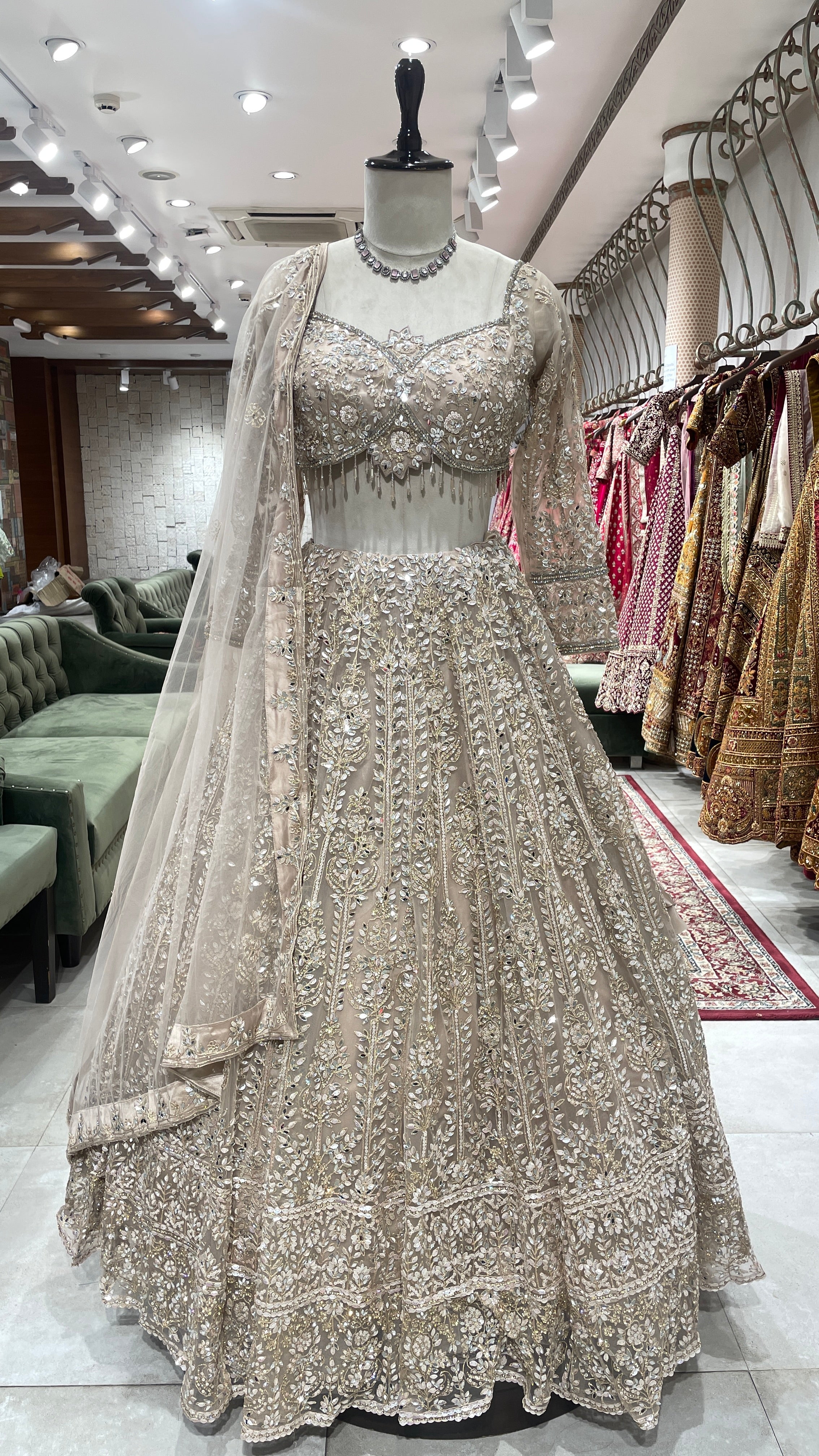 Gold net lehenga with mirror work