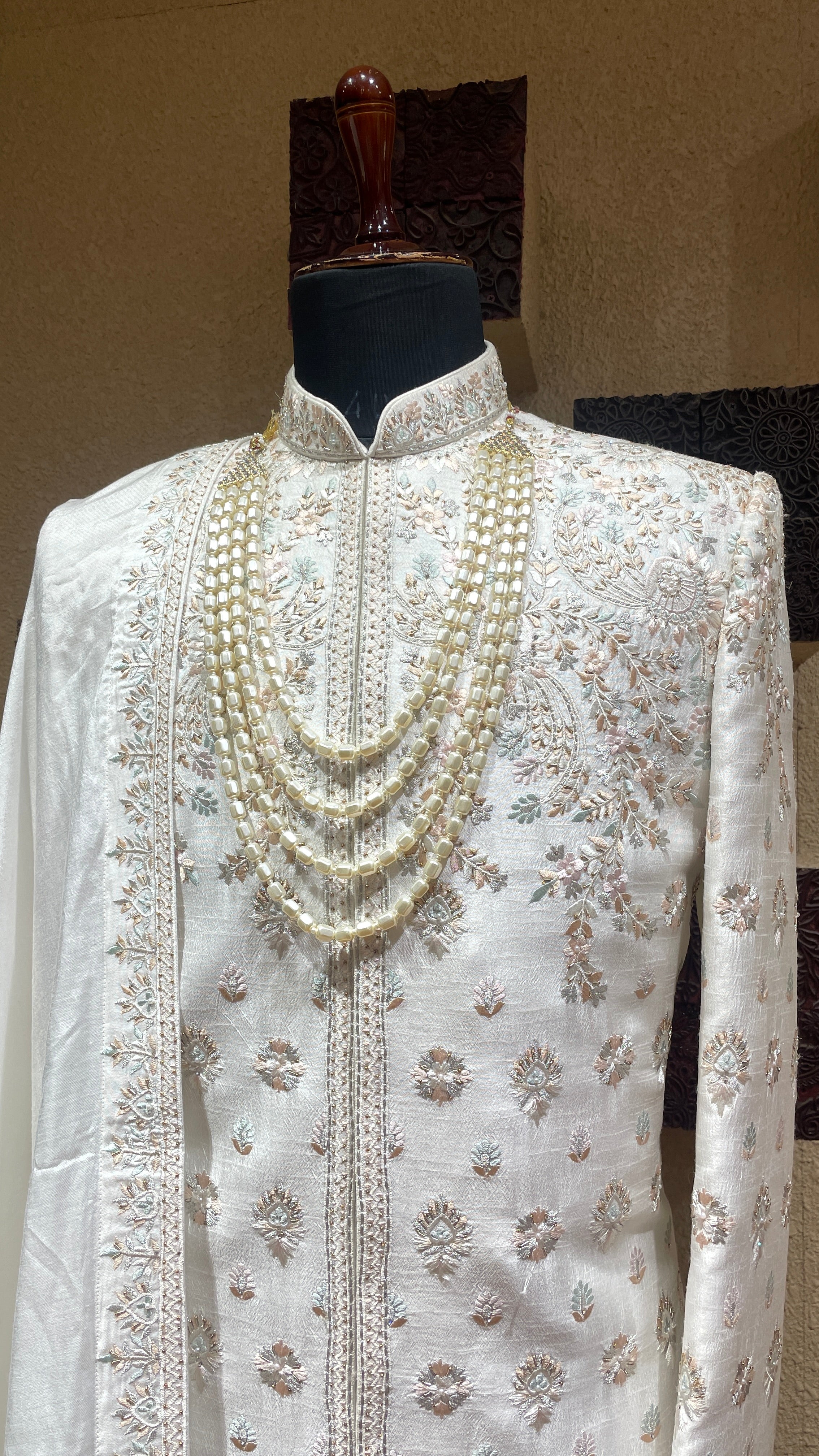 Ivory silk sherwani with floral motifs